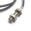 Used Omron E2E-X1R5E2 Proximity Sensor, Range: 1.5mm, Barrel: M8, 12-24VDC, 3' Cable