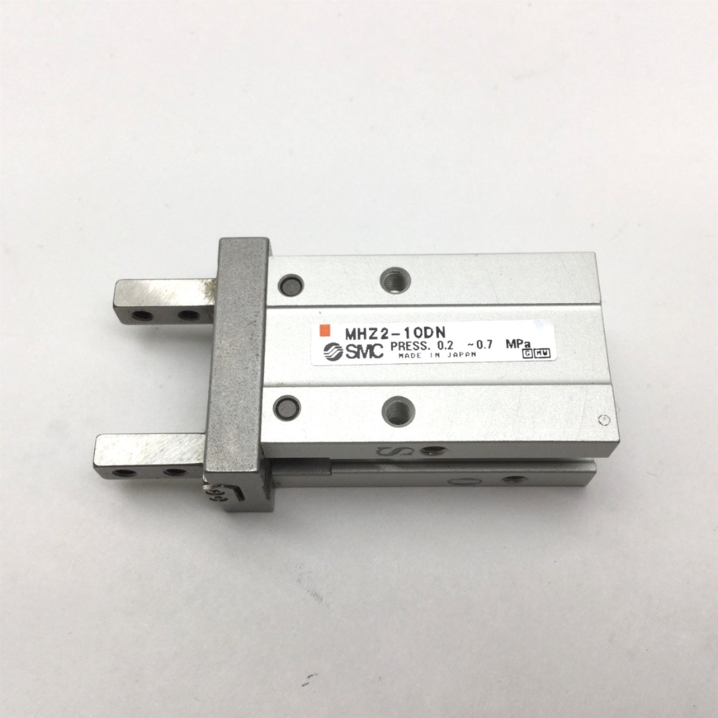 Used SMC MHZ2-10DN Pneumatic Parallel Gripper, Bore: 10mm, Stroke: 4mm, 0.2-0.7MPa