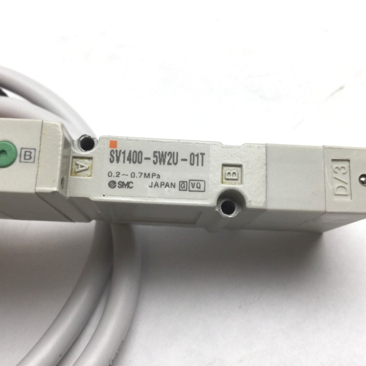 Used SMC SV1400-5W2U-01T Solenoid Valve, 3-Position 5-Port, 24VDC, 0.2-0.7MPa