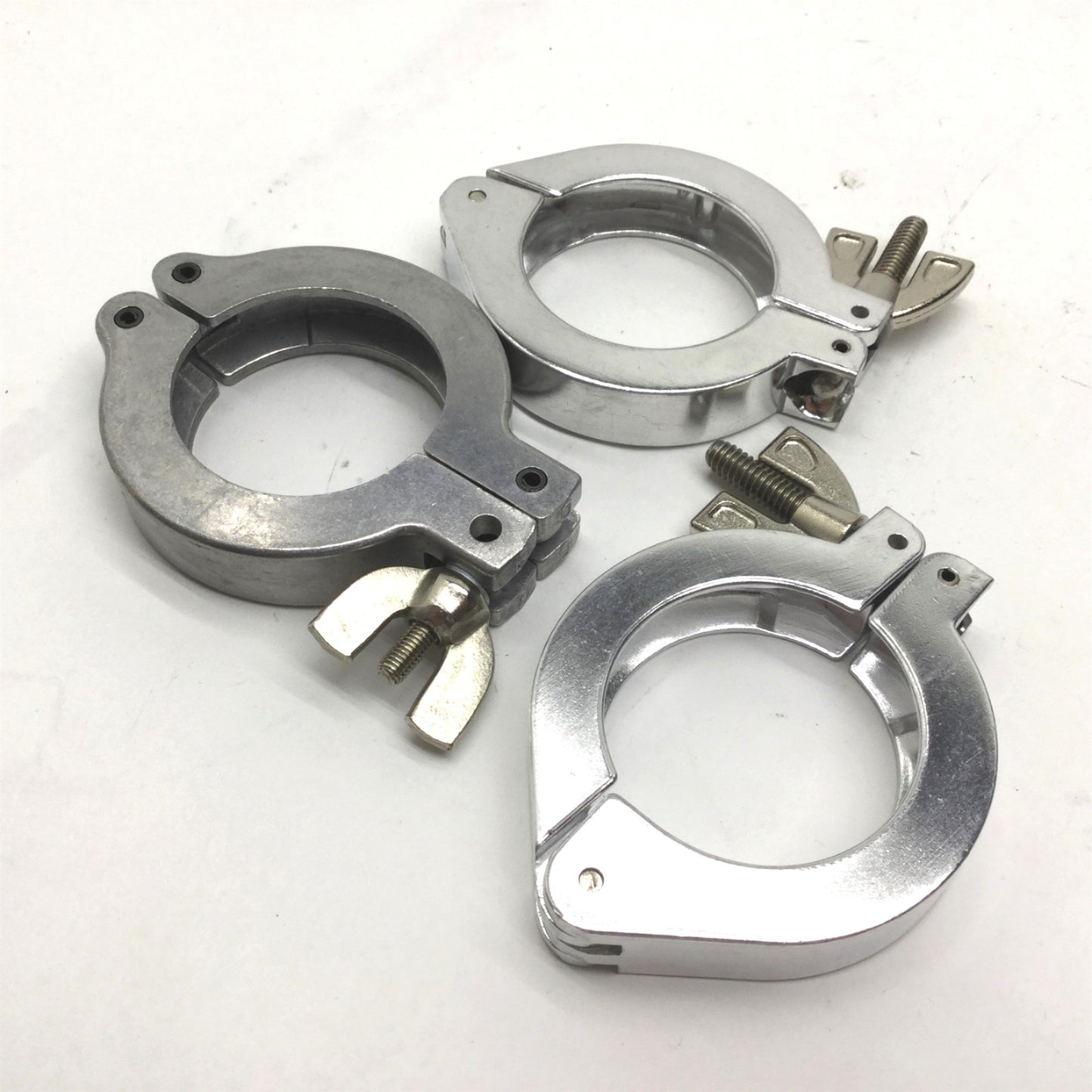 Used Lot of 7 Miscellaneous Single-Pin Vacuum Tri Clamps 3x ID: 1.75" 4x ID: 1.125"