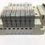 Used Manifold of SMC SV1100-5FU-TS-N7 (5x) , SV1400-5FU (2x) Solenoid Valves, 24VDC