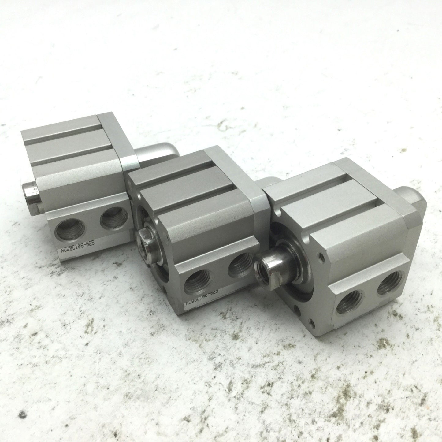 Used Lot of 3 SMC NCQ8C106-025 Pneumatic Cylinders, Bore: 1-1/16" Stroke: 1/4" Clevis