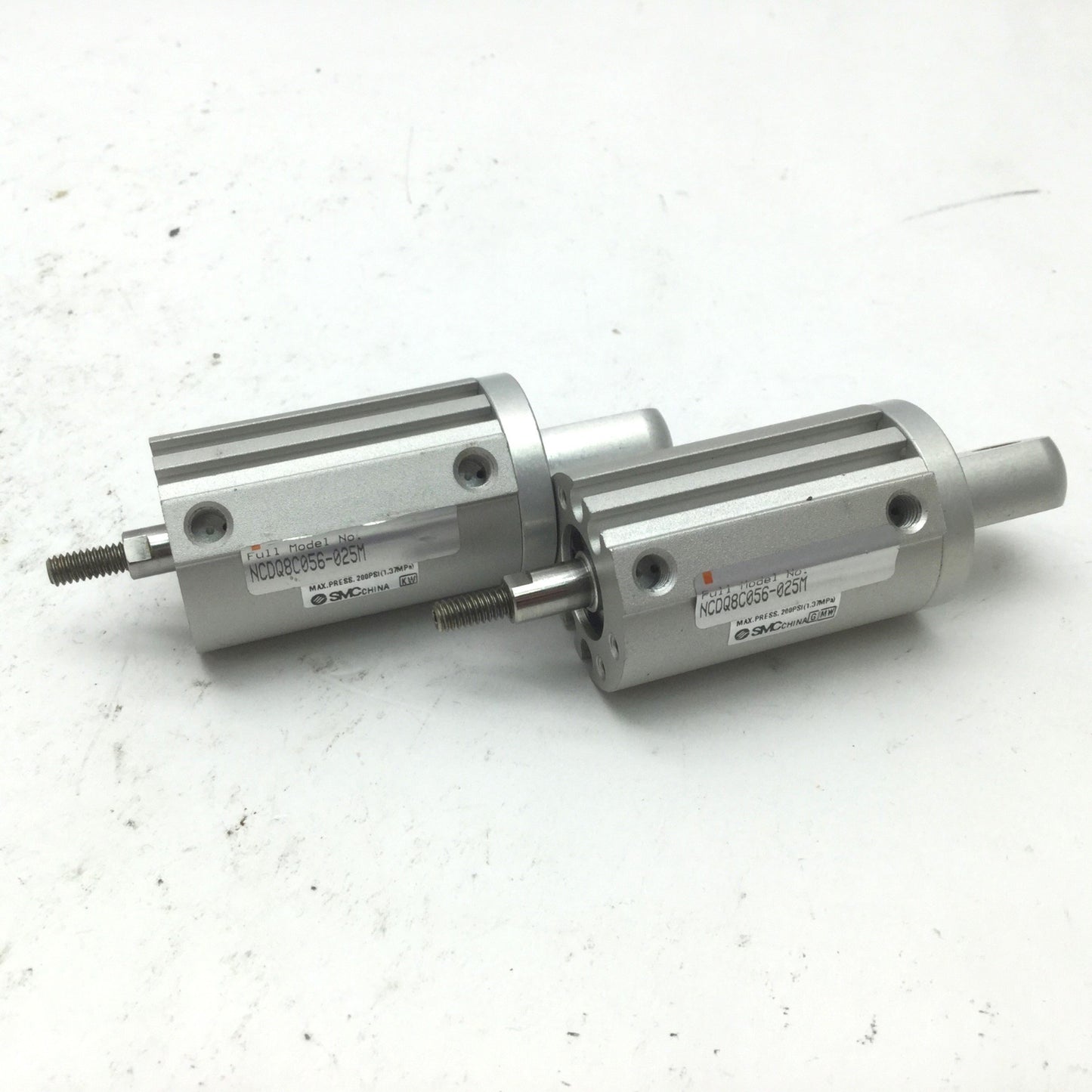 Used Lot of 2 SMC NCDQ8C056-025M Pneumatic Cylinders, Bore: 9/16" Stroke: 1/4" Clevis