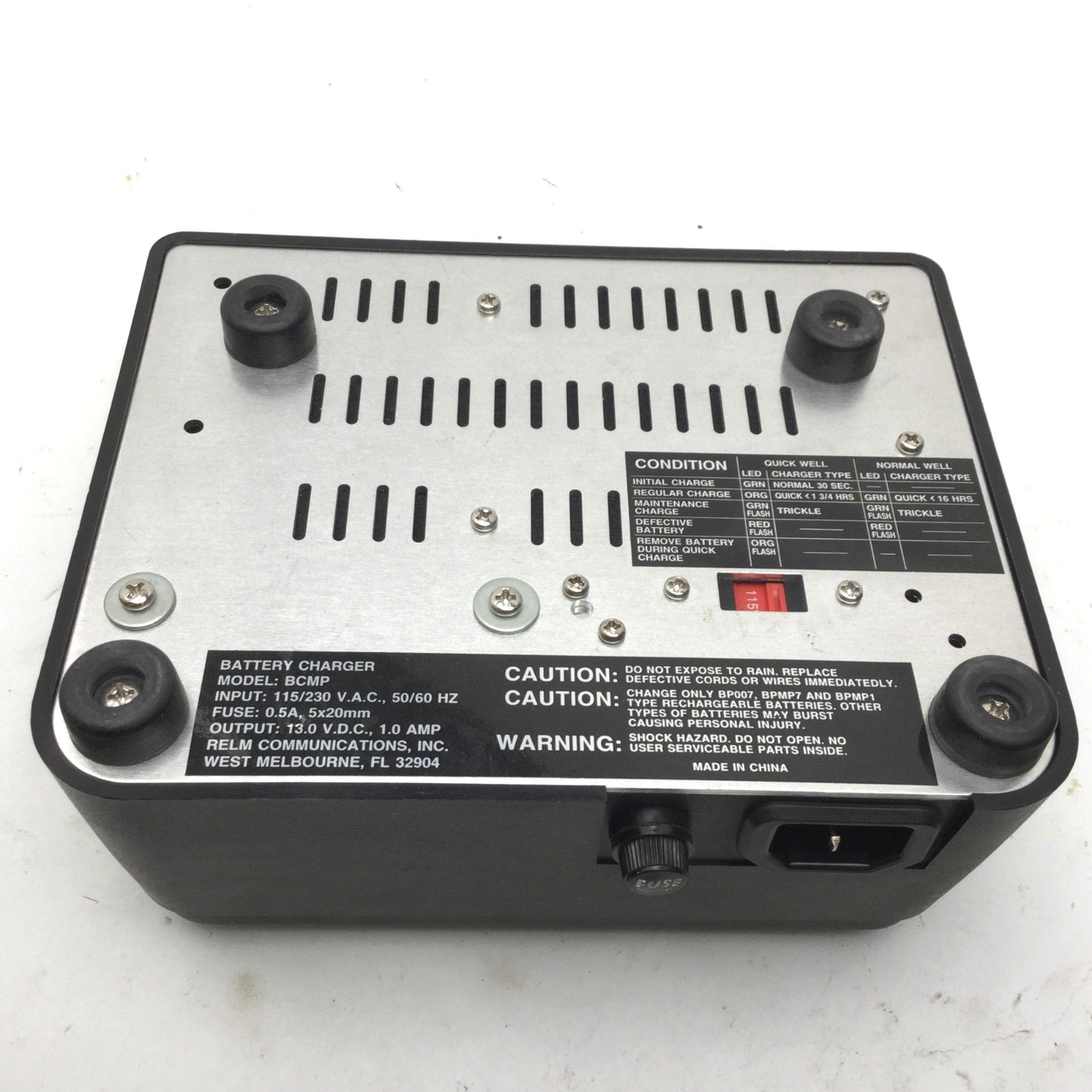 Used Relm BCMP MINI-COM Battery Charger, Output: 13VDC, 1A, Input: 115/230VAC