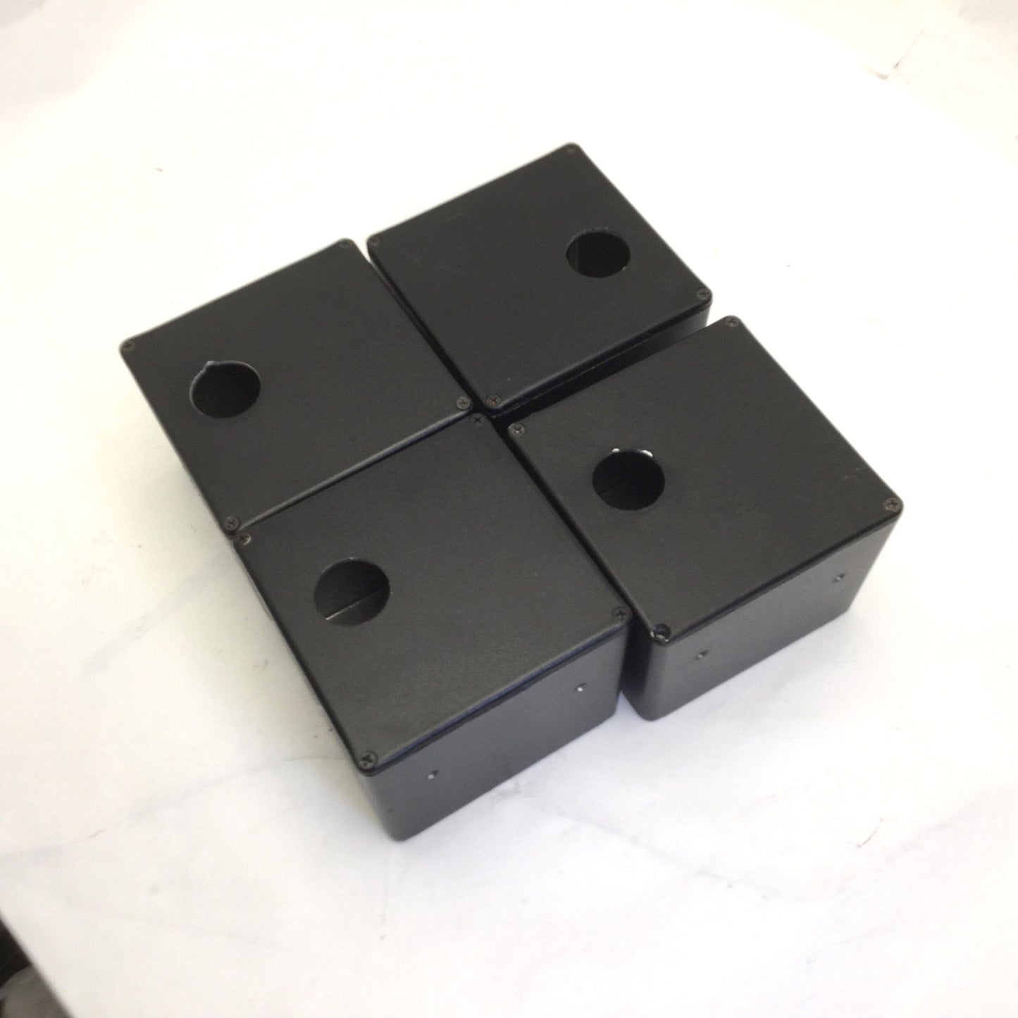 Used Lot of 4 Aluminum Enclosures Dimensions: 4-3/4" x 4-3/4" x 3-3/4" *Has Holes*