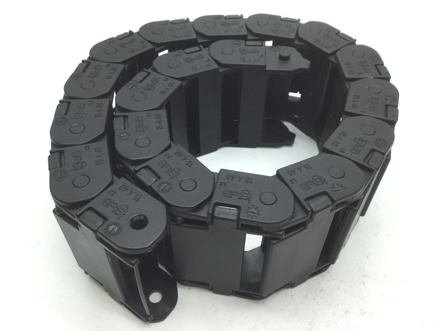 Used Igus 15.4.48 Energy Chain, Dimensions: 24"(L) x 2.5"(W) x 1"(H), 19 Links