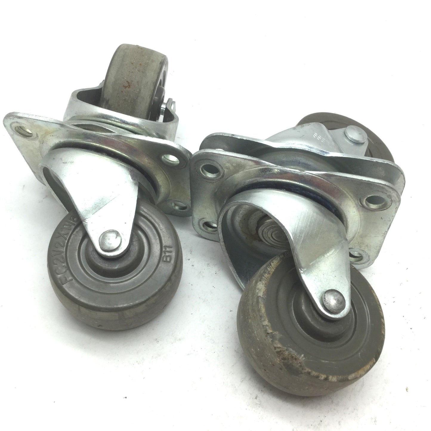 Used Lot of 4 Faultless Casters, 2-1/2" Diameter, 1-1/8" Width