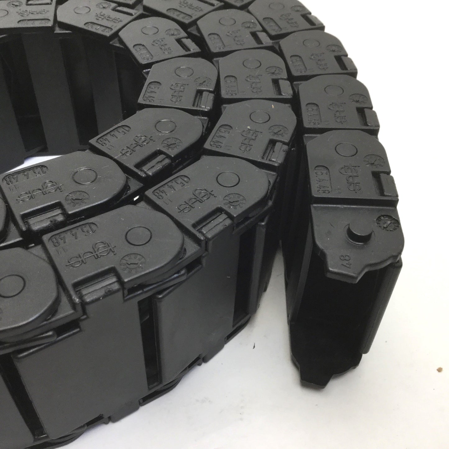 Used Igus 15.4.48 Energy Chain, Dimensions: 50"(L) x 2.5"(W) x 1"(H), *No Ends*