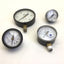 Used Lot of 4 Assorted Pneumatic Pressure Gauges 1/4" NPT, 10, 15, 15, 30PSI