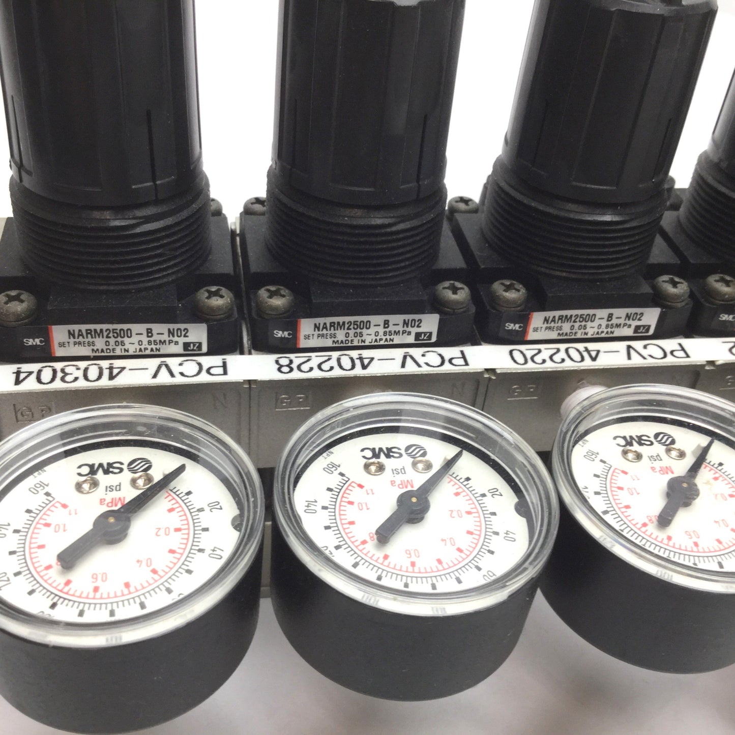 Used Manifold of 6 SMC NARM2500-B-N02 Regulator, Set Pressure: 0.05-0.85MPa, 1/4" NPT