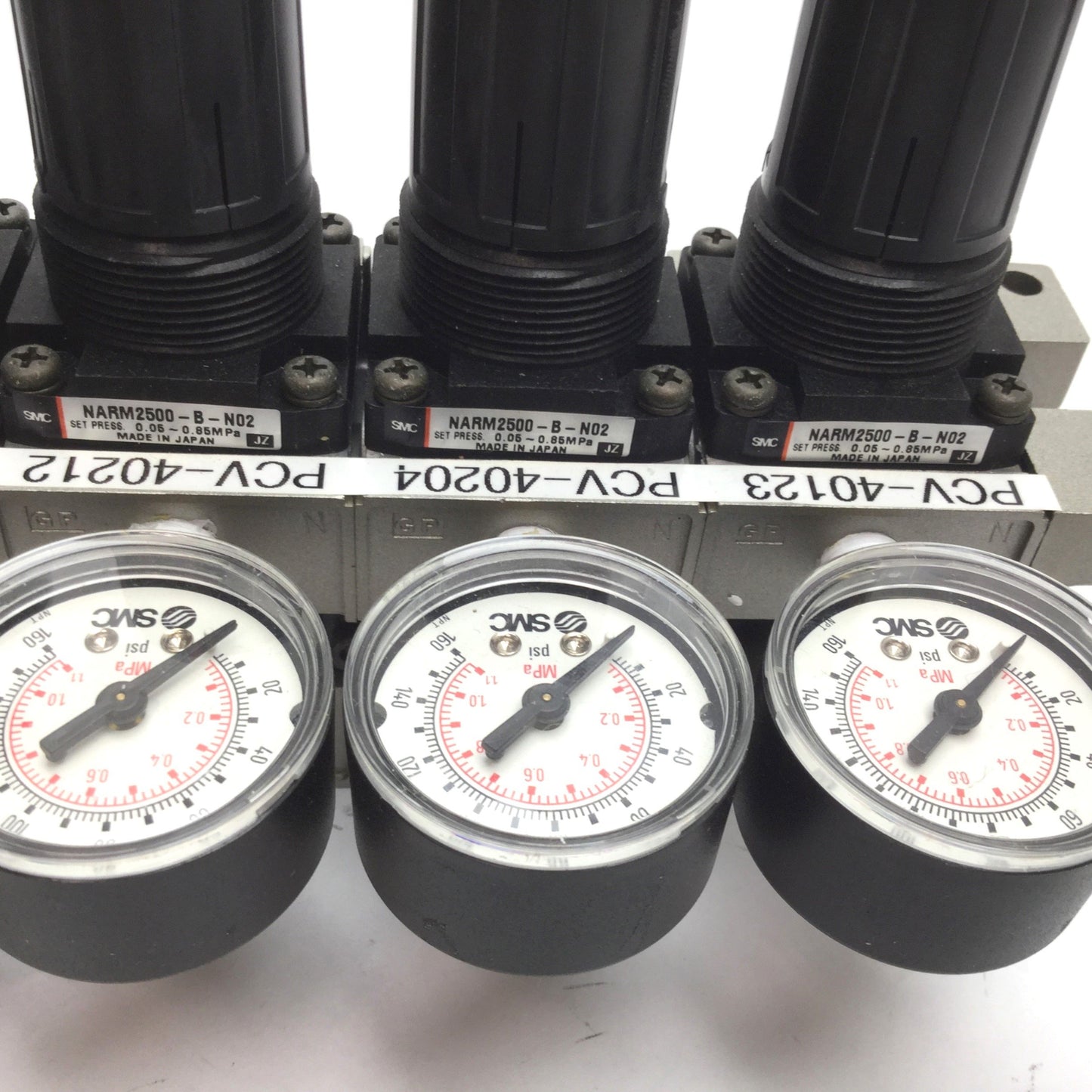 Used Manifold of 6 SMC NARM2500-B-N02 Regulator, Set Pressure: 0.05-0.85MPa, 1/4" NPT