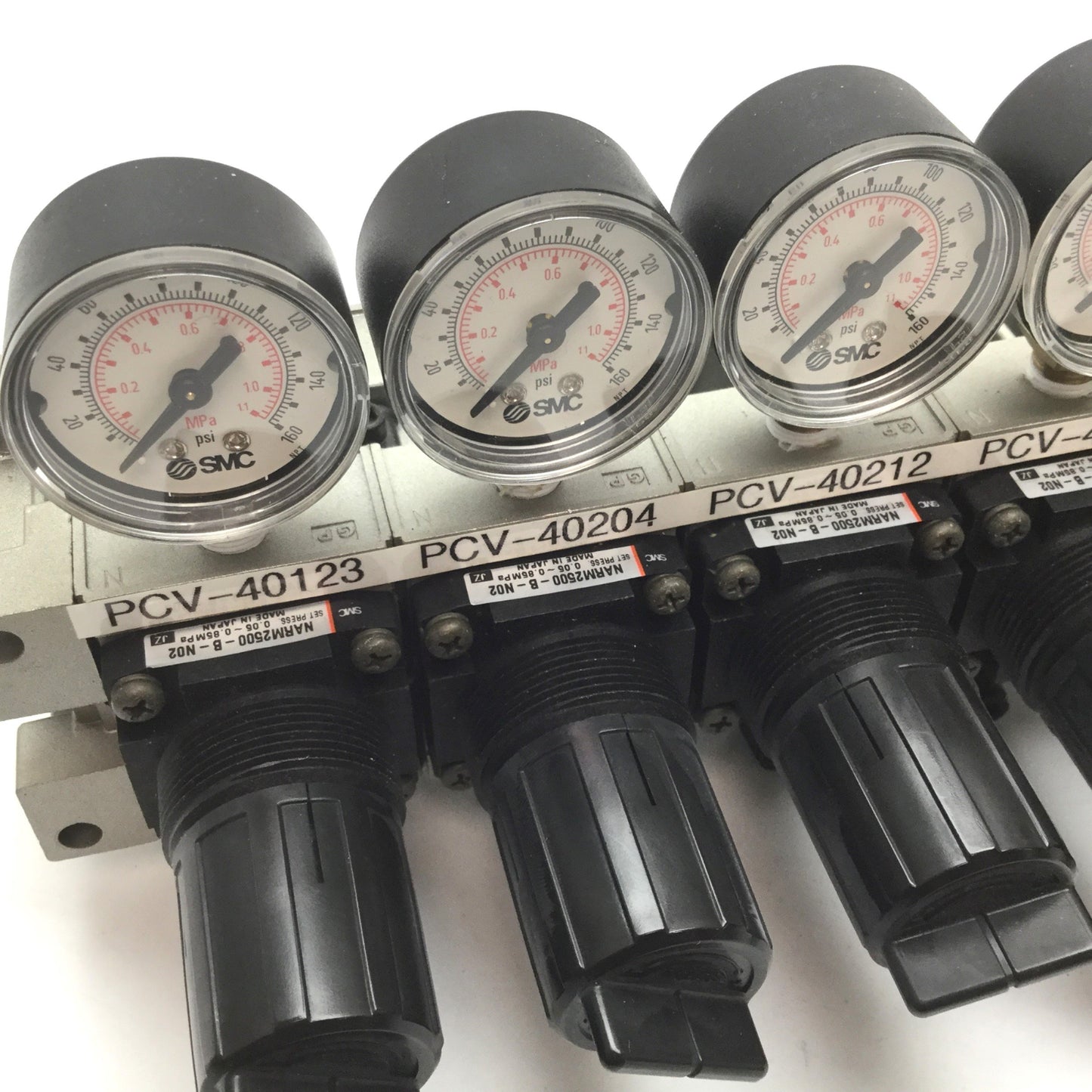 Used Manifold of 6 SMC NARM2500-B-N02 Regulator, Set Pressure: 0.05-0.85MPa, 1/4" NPT
