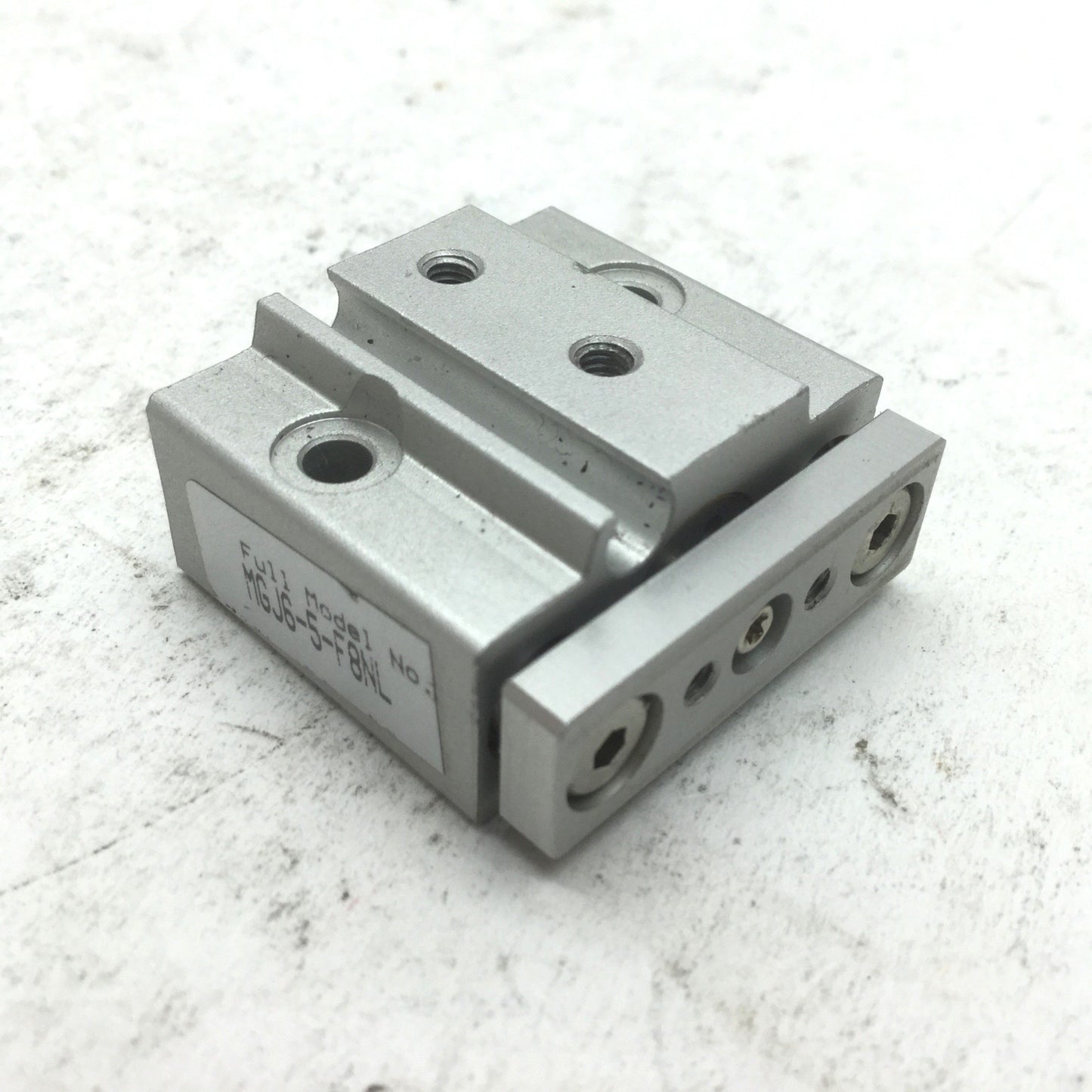 Used SMC MGJ6-5 Miniature Guide Rod Cylinder 5mm Stroke, 6mm Bore