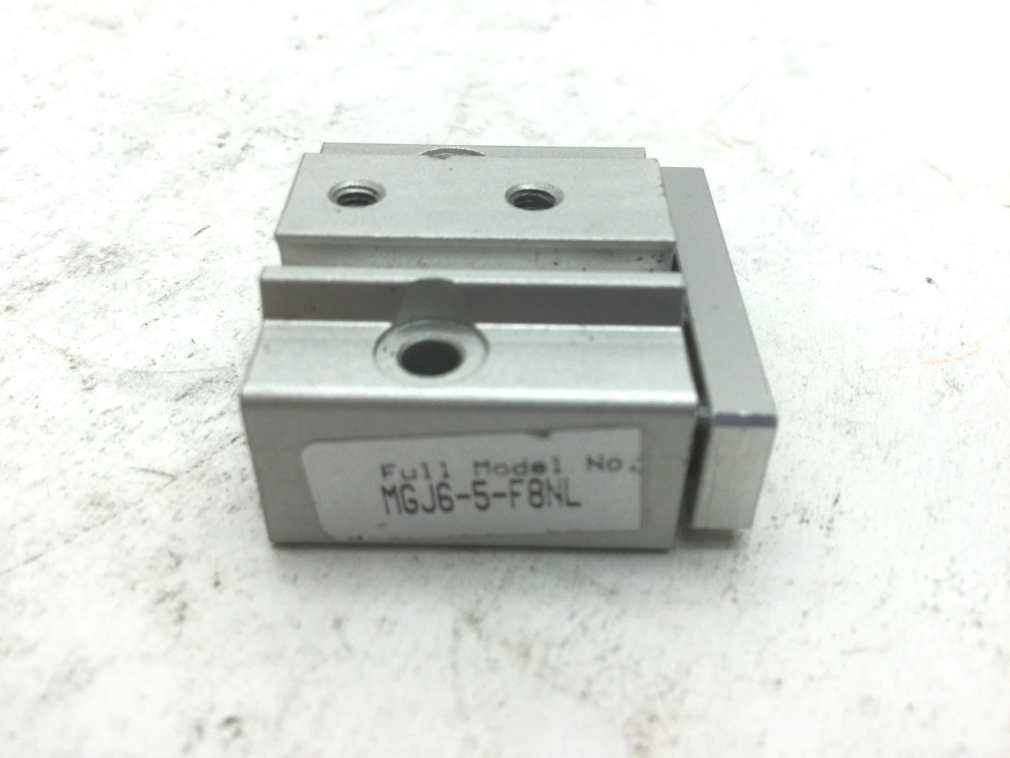 Used SMC MGJ6-5 Miniature Guide Rod Cylinder 5mm Stroke, 6mm Bore