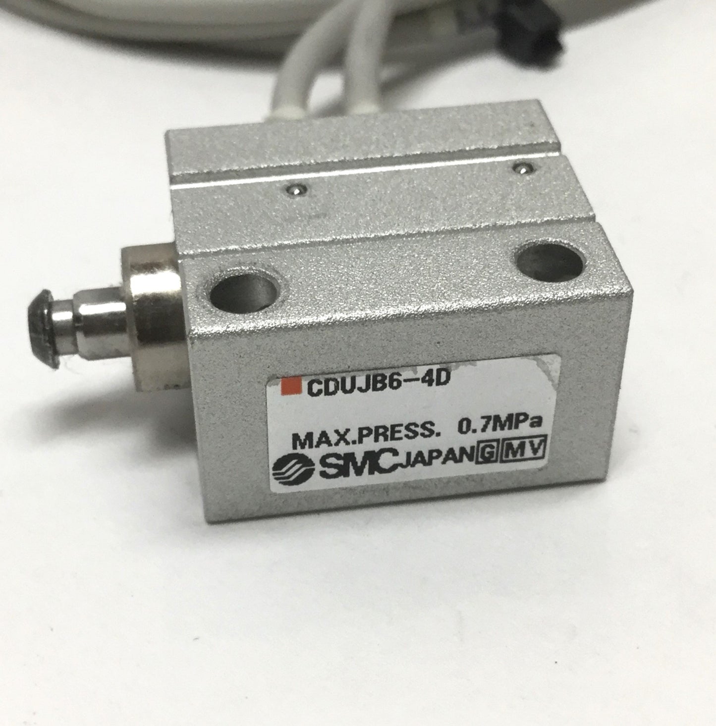 Used SMC CDUJB6-4D Mini Free-Mount Cylinder, 6mm Bore, 4mm Stroke, 0.7MPa w/Switches