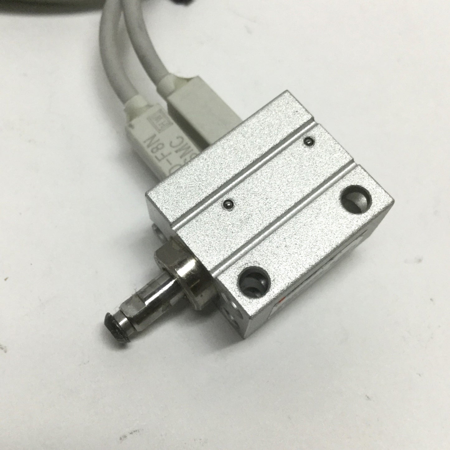 Used SMC CDUJB6-4D Mini Free-Mount Cylinder, 6mm Bore, 4mm Stroke, 0.7MPa w/Switches