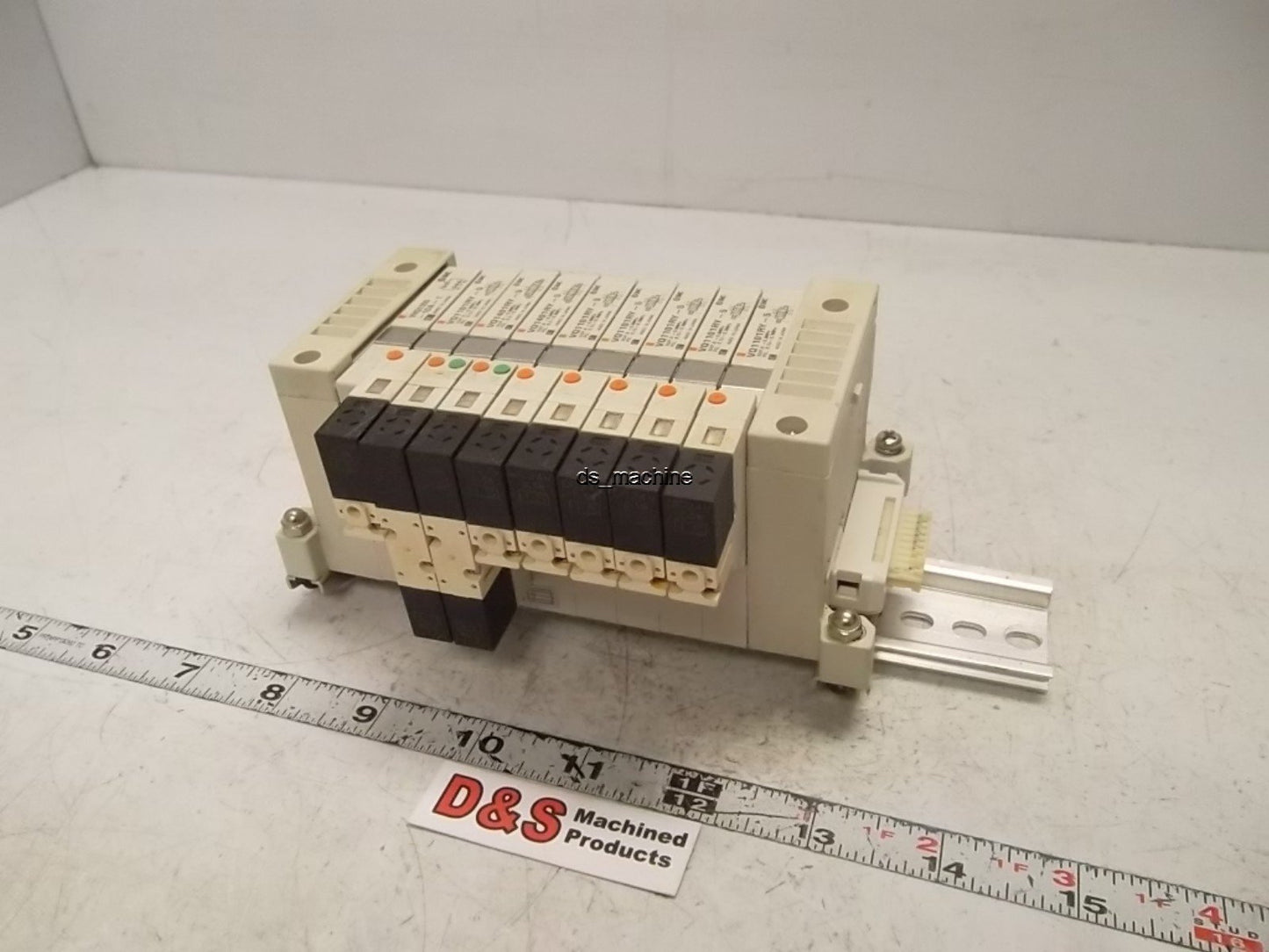 Used SMC Bank of 9 Valves (6) VQ1101RY-5, (2) VQ1401RY-5