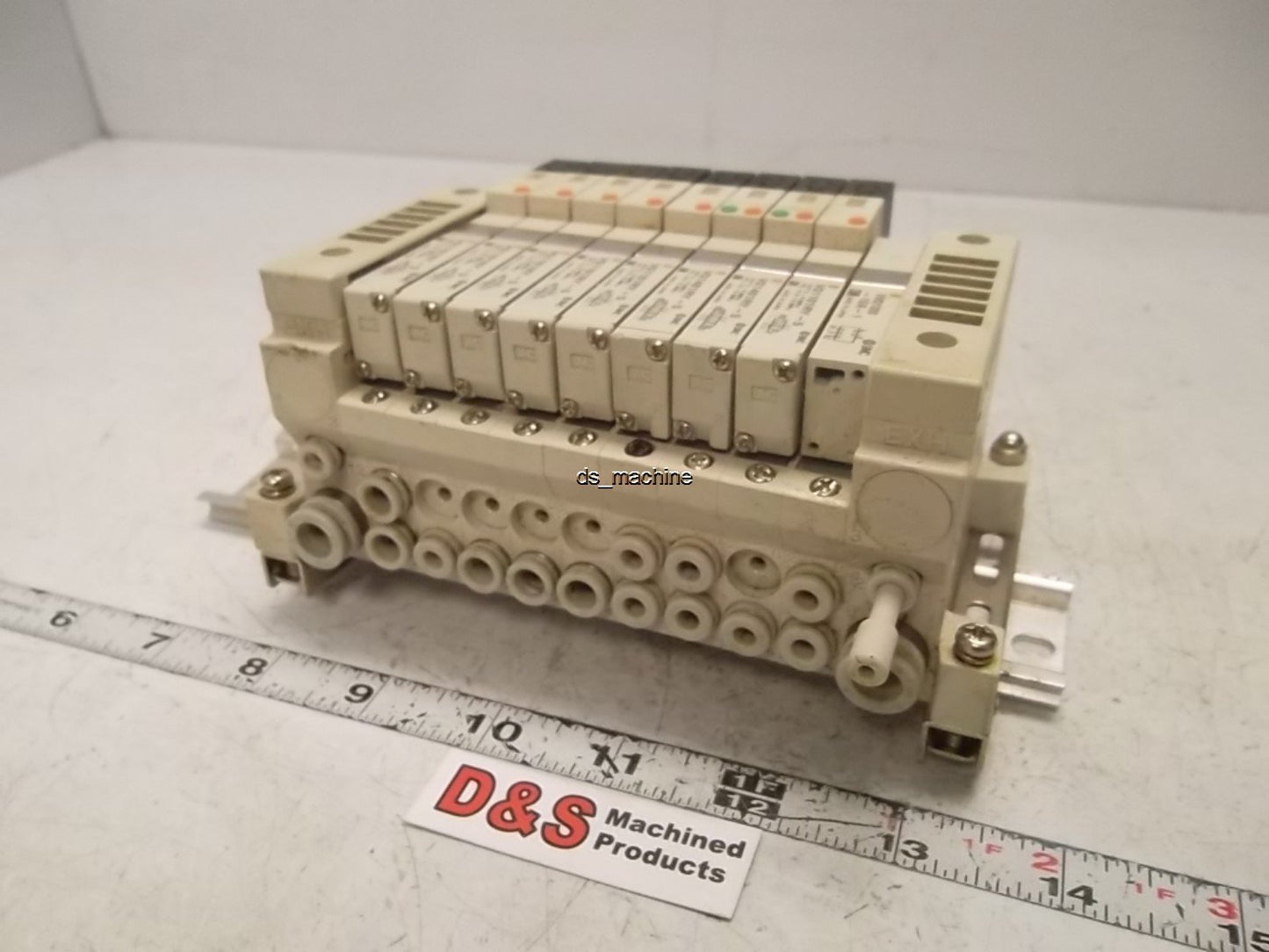 Used SMC Bank of 9 Valves (6) VQ1101RY-5, (2) VQ1401RY-5