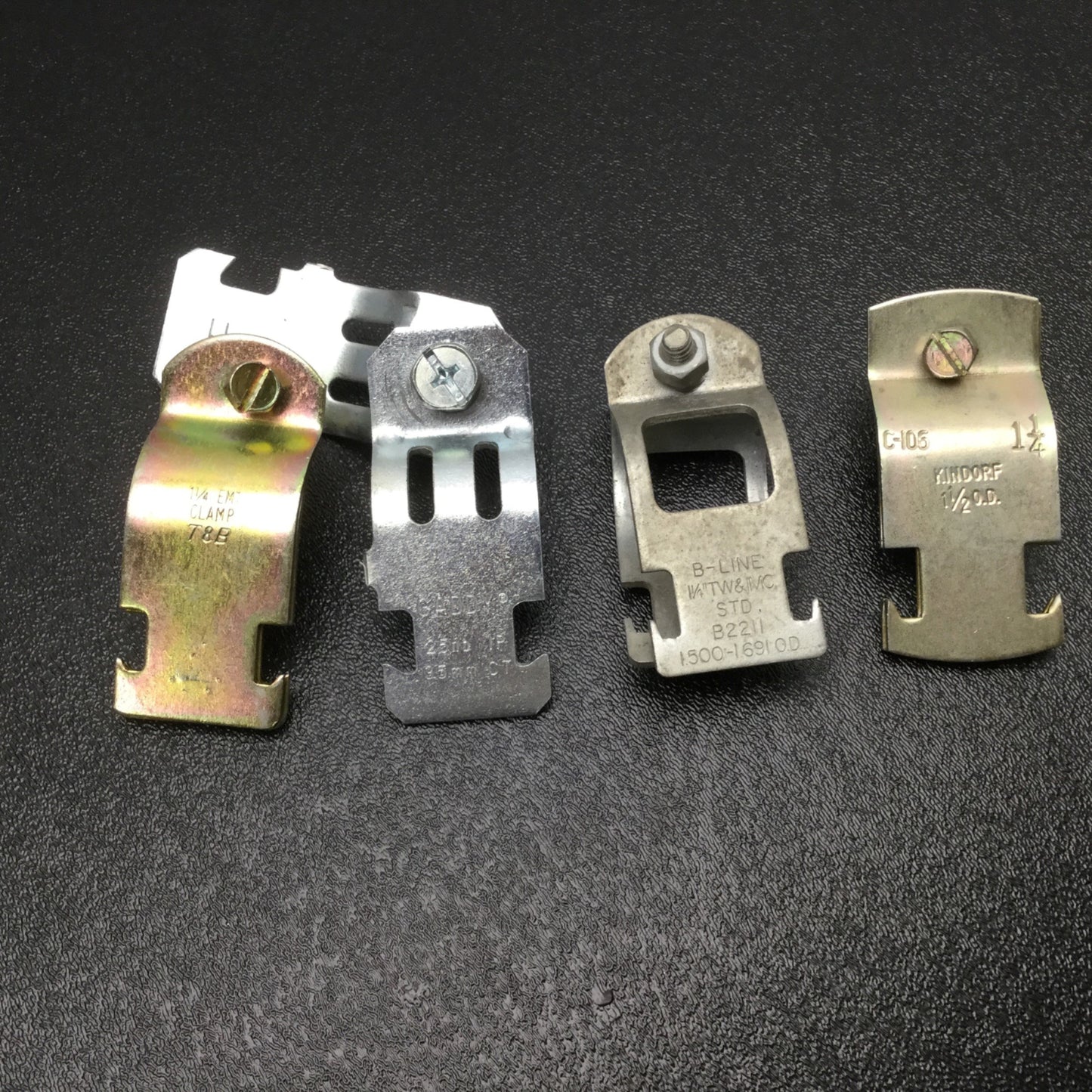 New Lot Of Assorted 1-1/4" EMT Unistrut Conduit/Pipe Hangers Approximately 7 Pounds