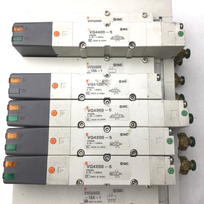 Used Bank of 5 SMC 1x VQ4100-5, 2x VQ4200-5, 1x VQ4300-5, 1x VQ4400-5 Solenoid Valves