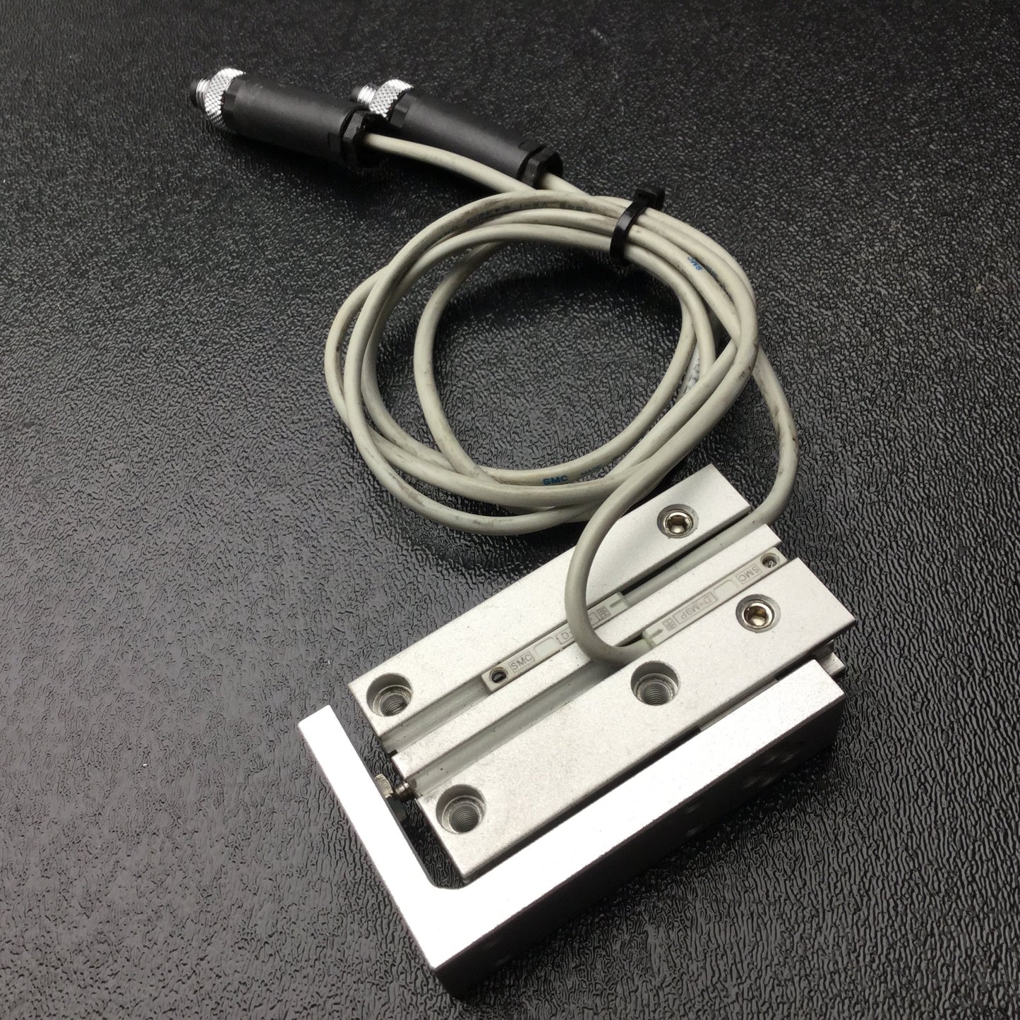 Used SMC MXH6-30 Pneumatic Slide Table, Ports: M5x0.8 10-32, Stroke: 30mm, Bore: 6mm