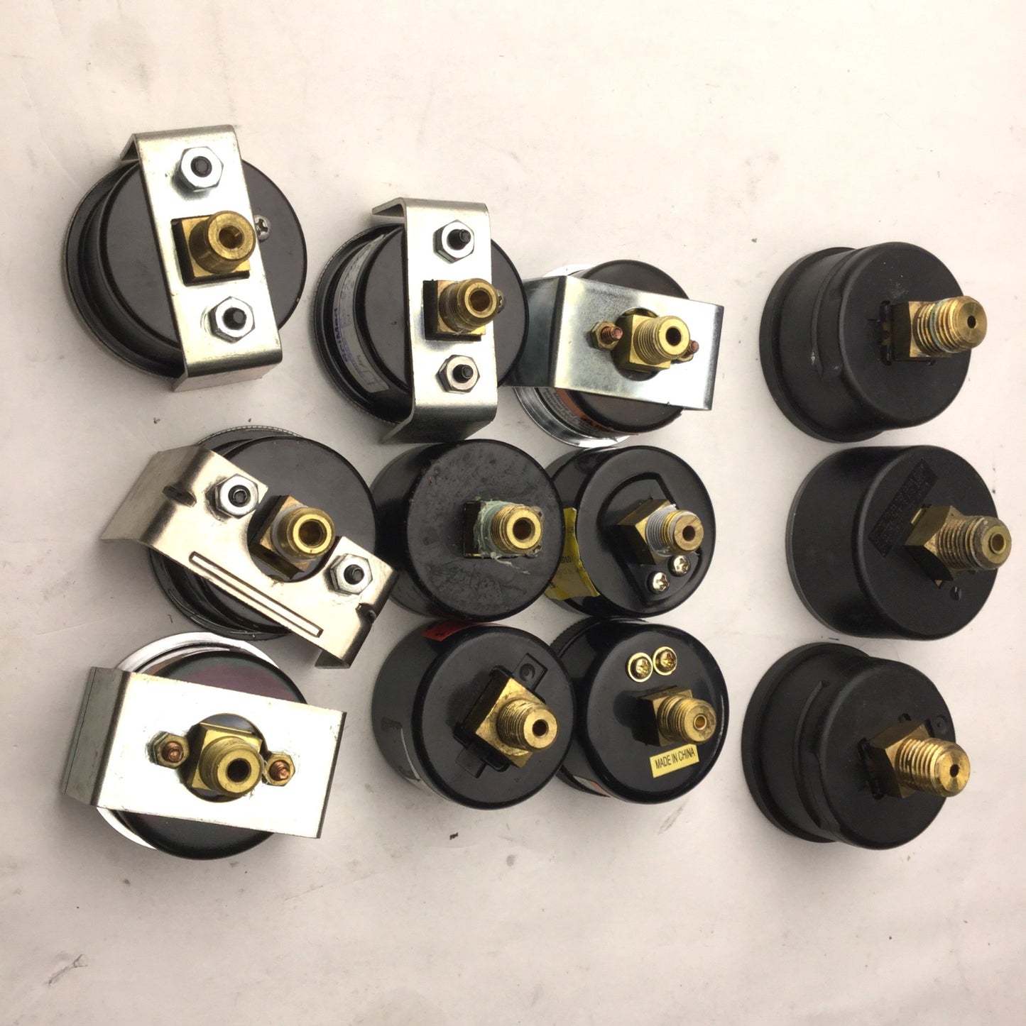 Used Lot of 12 Miscellaneous Pressure Gauges, 9x 1/8" NPT, 3x 1/4" NPT, 0-60 PSI