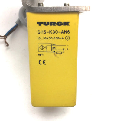 Used Turck Si15-K30-AN6 Slot Sensor, Slot: 30mm, Range: 15mm, Bracket *Deep Scratches