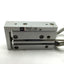 Used SMC MXU6-25 Compact Slide 6mm Bore 25mm Stroke 10-32UNF Ports D-F9N Switches