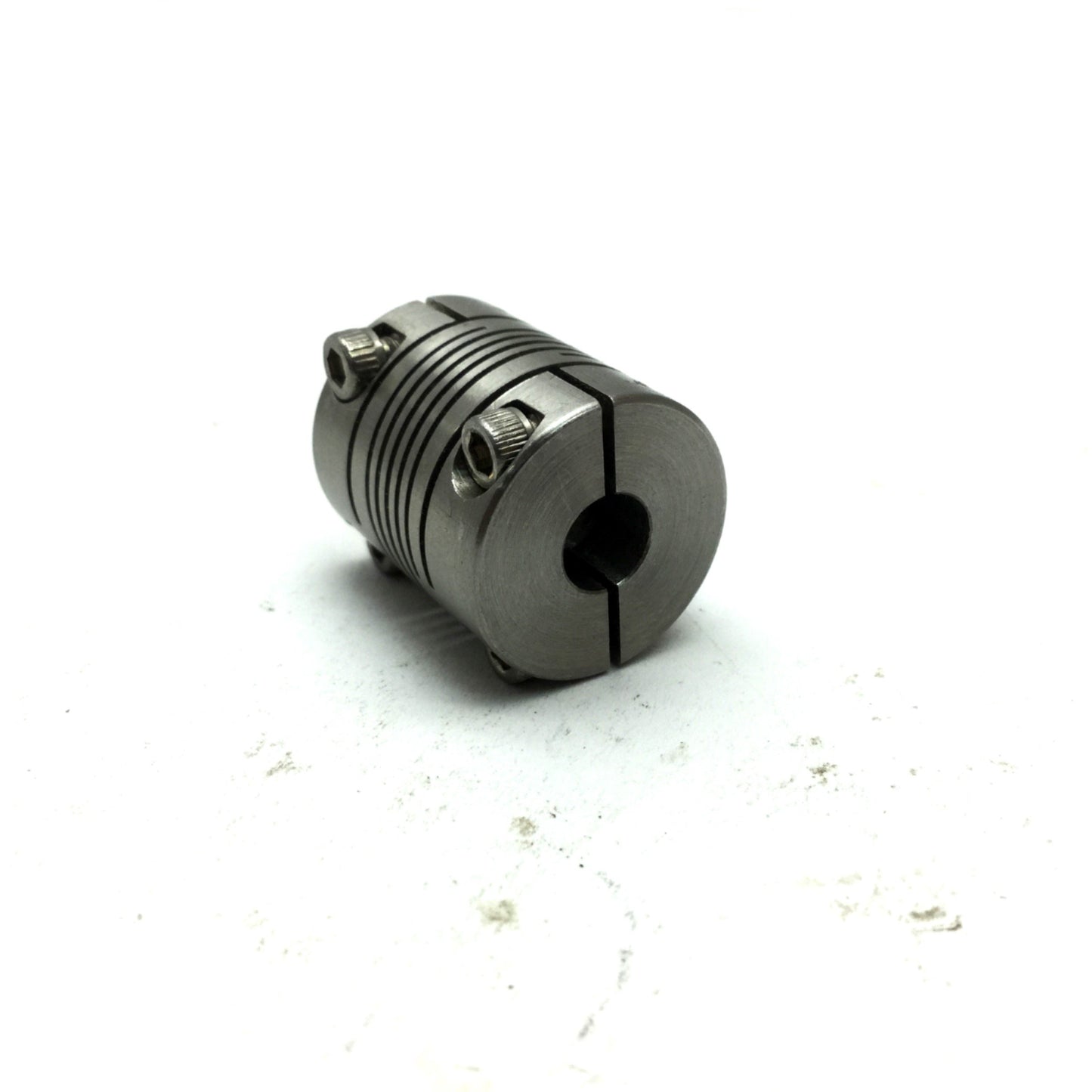 Used Flexible Shaft Clamping Coupling, OD: 3/4", 1/4" ID, Length: 1"