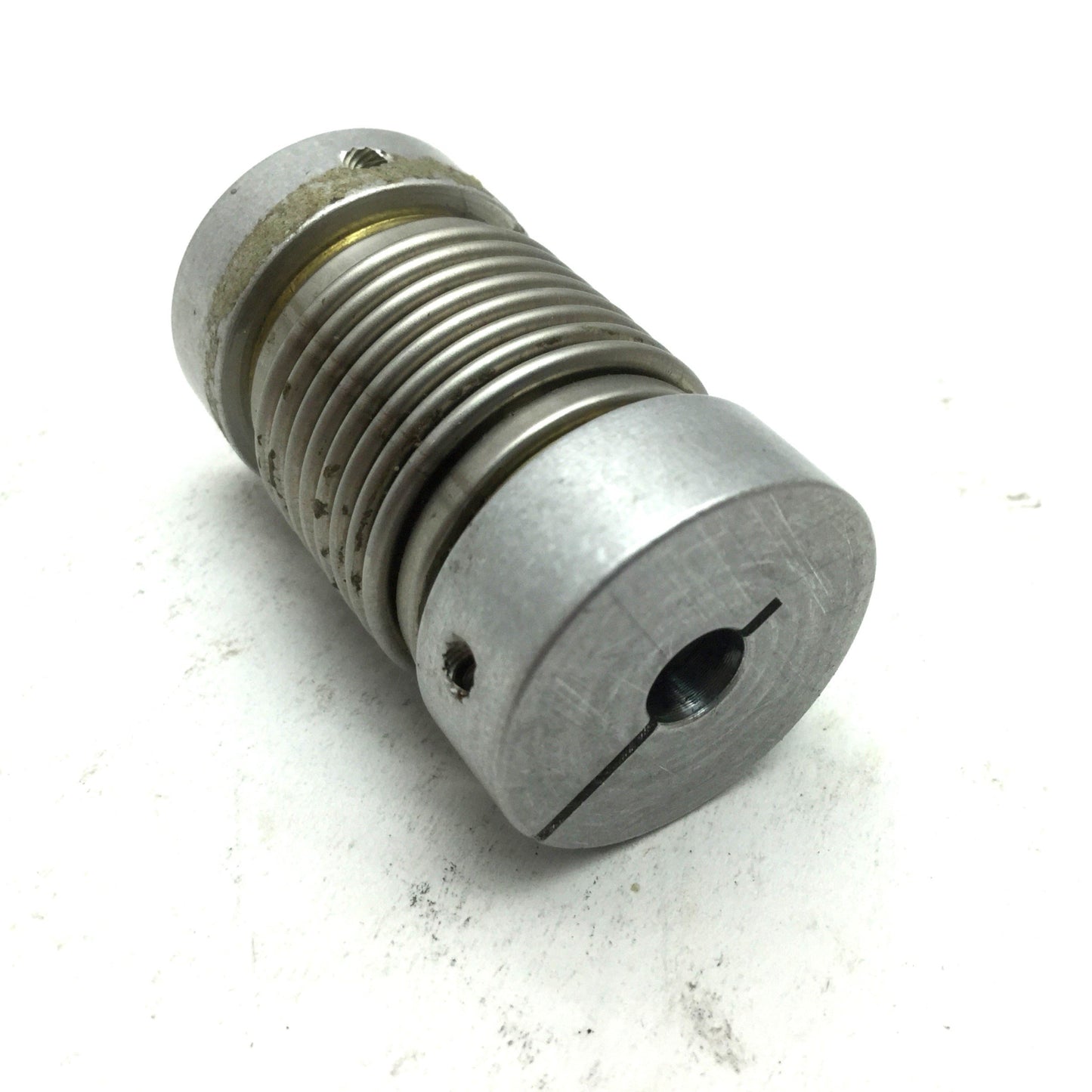 Used Flexible Shaft Clamping Coupling, OD: 1" ID: 1/4" Length: 1-11/16"
