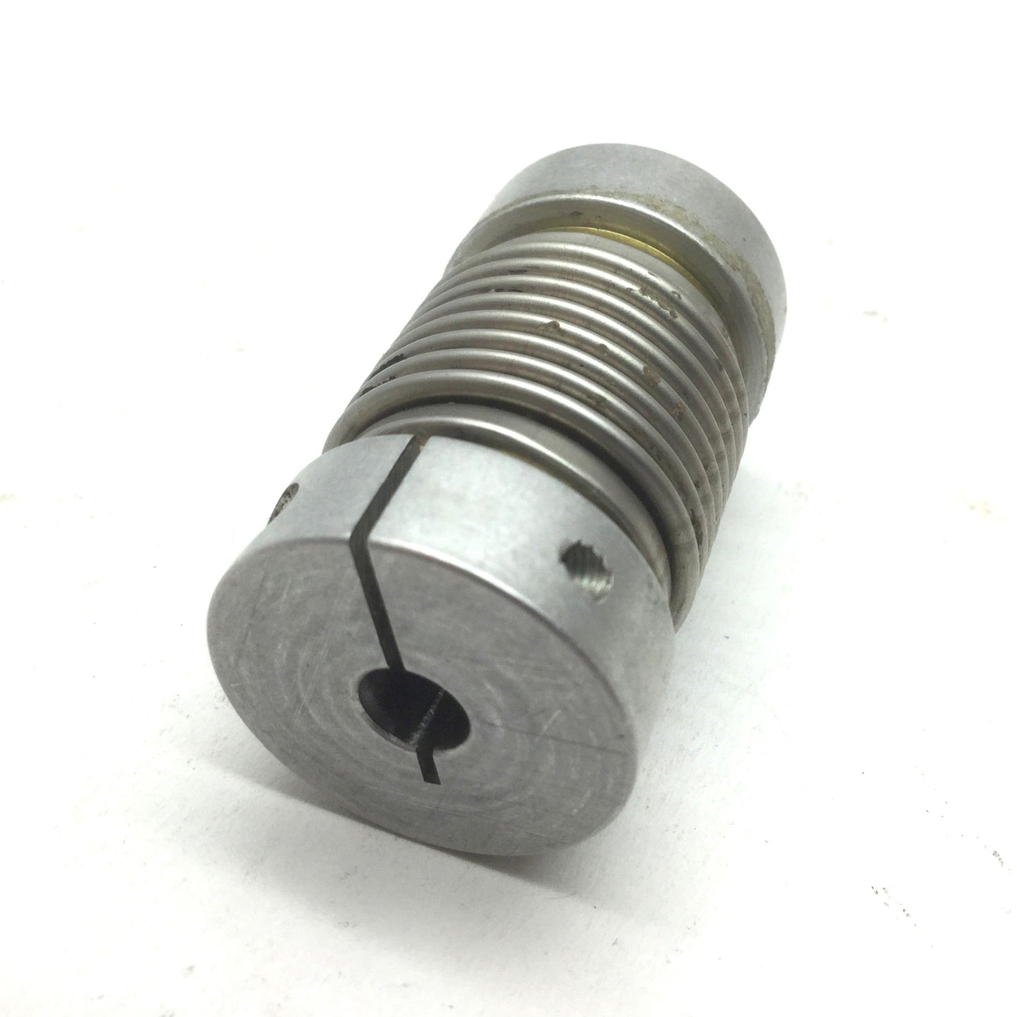 Used Flexible Shaft Clamping Coupling, OD: 1" ID: 1/4" Length: 1-11/16"