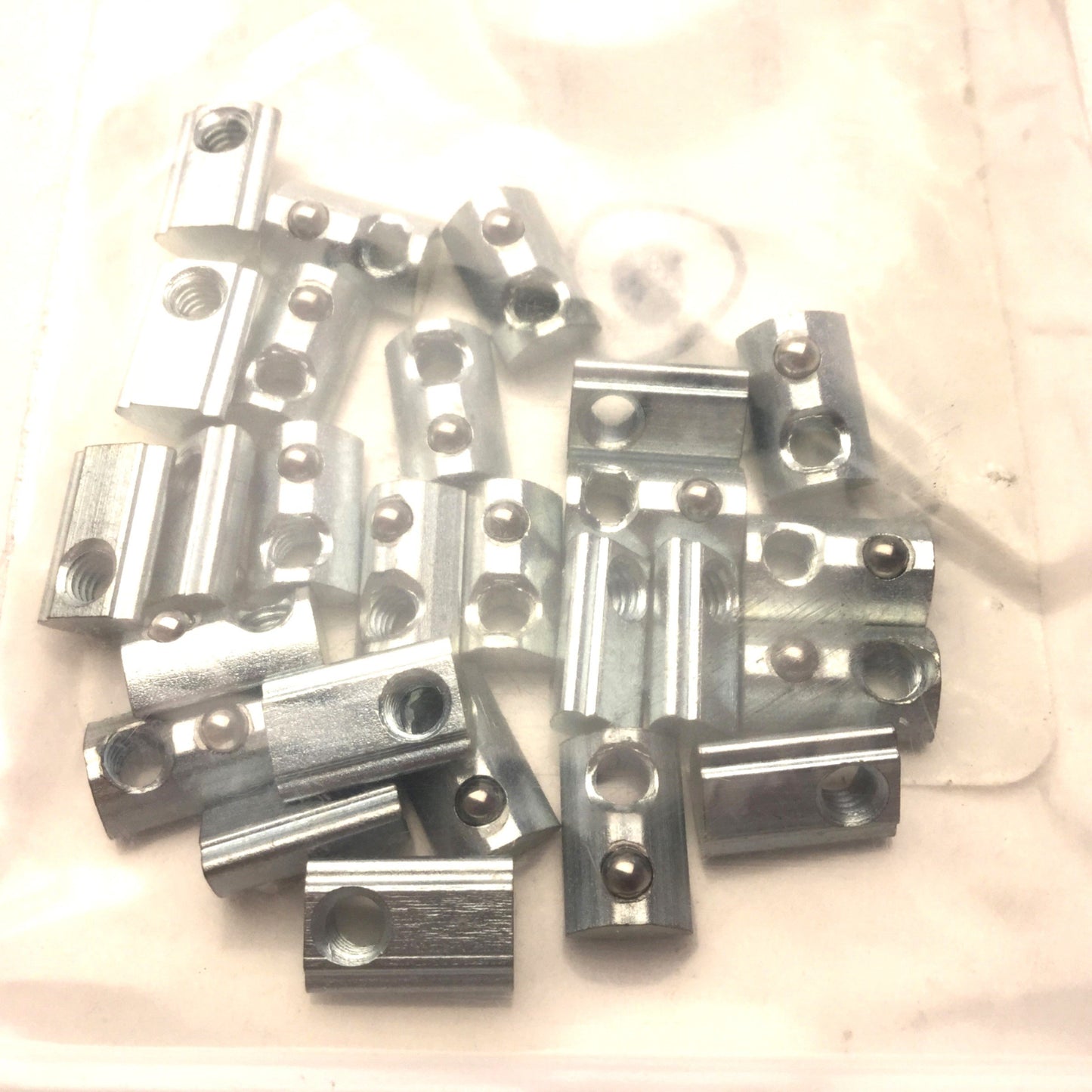 New – Open box Lot of 26 Fath 102687 Roll-In T-Slot Nut, 7.7 x 4.6mm, With Spring Loaded Ball