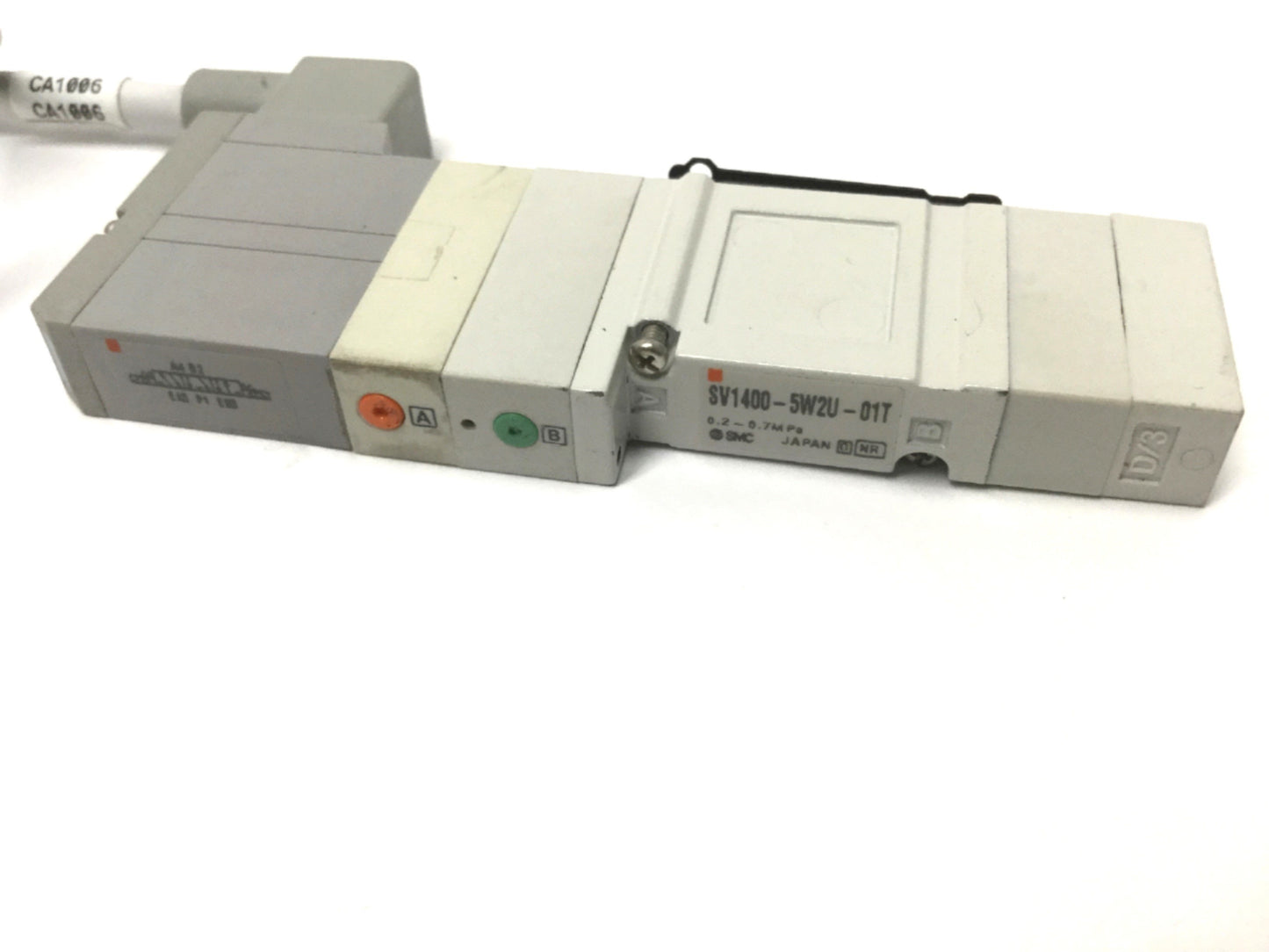 Used SMC SV1400-5W2U-01T Double Solenoid Valve, 3-Position 5-Port, 24VDC, 0.2-0.7MPa