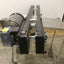 Used  AMC M0203806R060 Chain Conveyor 5' Long 6" Wide 230/460VAC 1.25ft/sec
