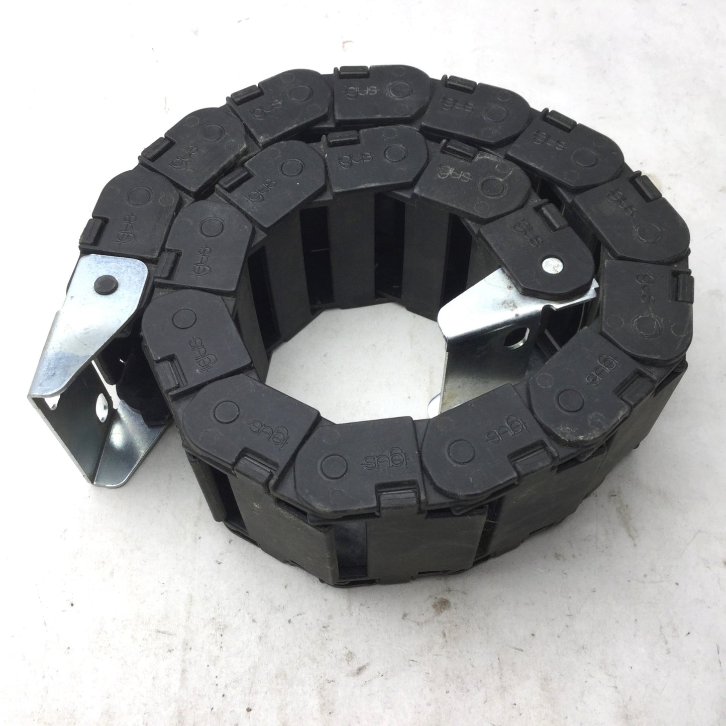 Used Igus 15.4.48 Energy Chain, Dimensions: 22"(L) x 2-3/8"(W) x 15/16"(H), 18 Links