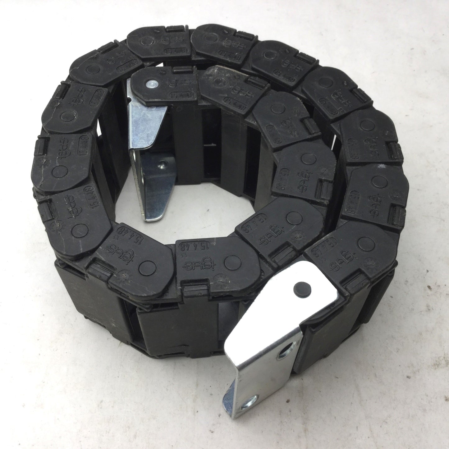 Used Igus 15.4.48 Energy Chain, Dimensions: 22"(L) x 2-3/8"(W) x 15/16"(H), 18 Links