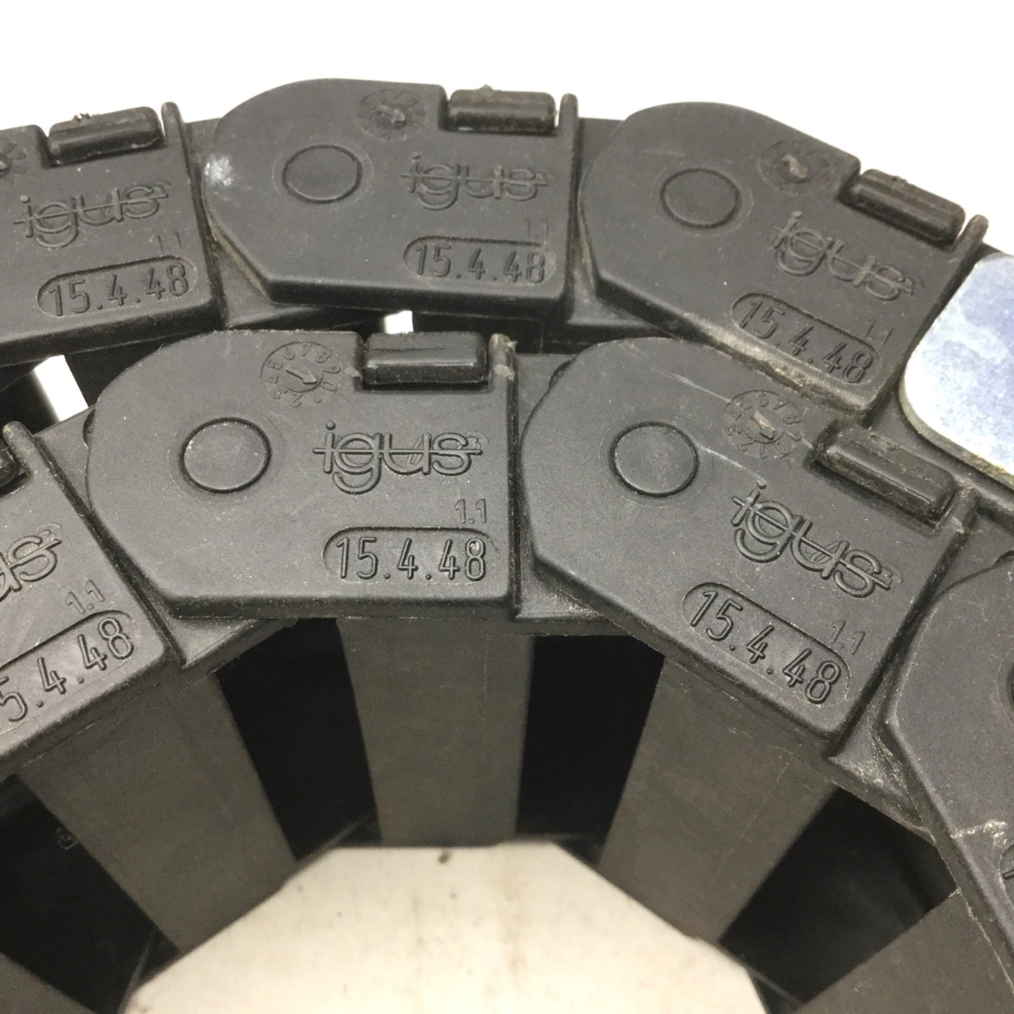 Used Igus 15.4.48 Energy Chain, Dimensions: 22"(L) x 2-3/8"(W) x 15/16"(H), 18 Links