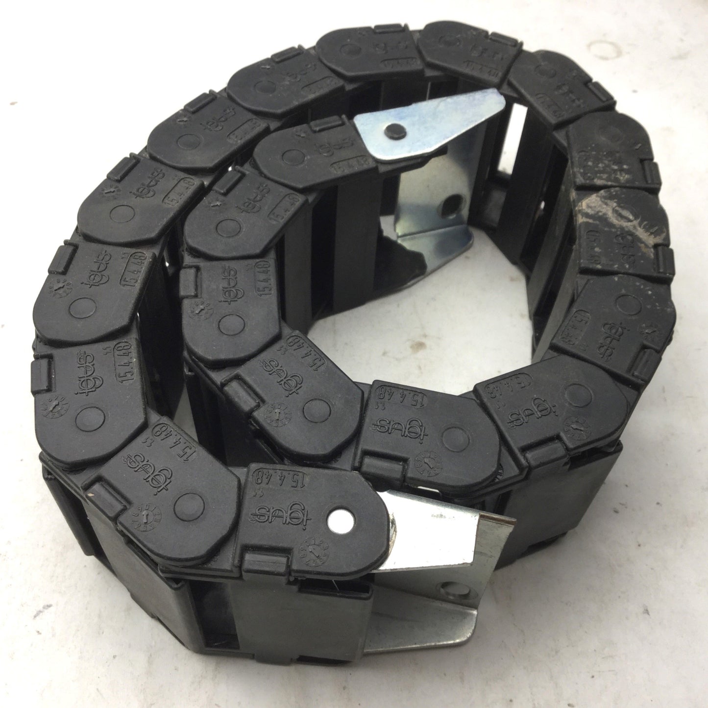 Used Igus 15.4.48 Energy Chain, Dimensions: 23.5"(L) x 2-3/8"(W) x 15/16"(H) 19 Links