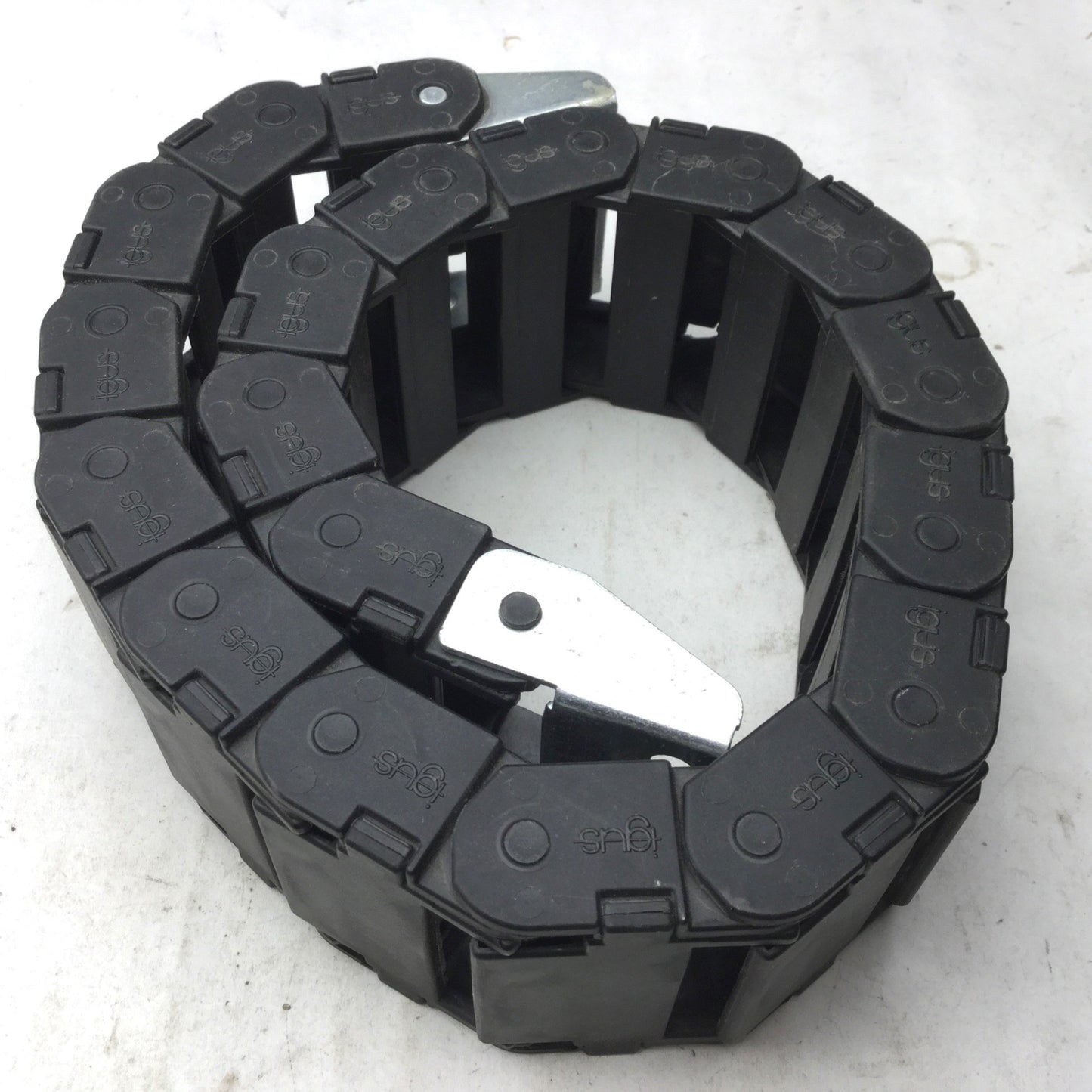Used Igus 15.4.48 Energy Chain, Dimensions: 23.5"(L) x 2-3/8"(W) x 15/16"(H) 19 Links