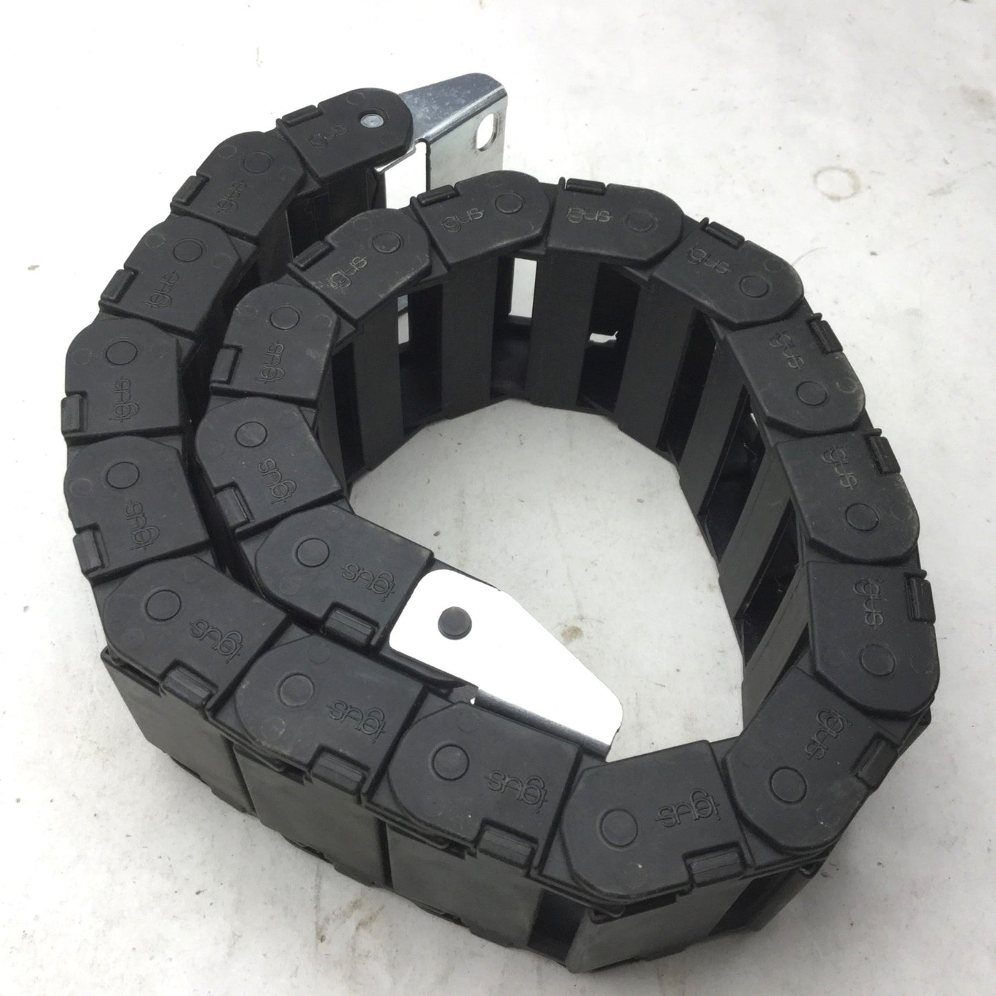 Used Igus 15.4.48 Energy Chain, Dimensions: 25"(L) x 2-3/8"(W) x 15/16"(H) 20 Links