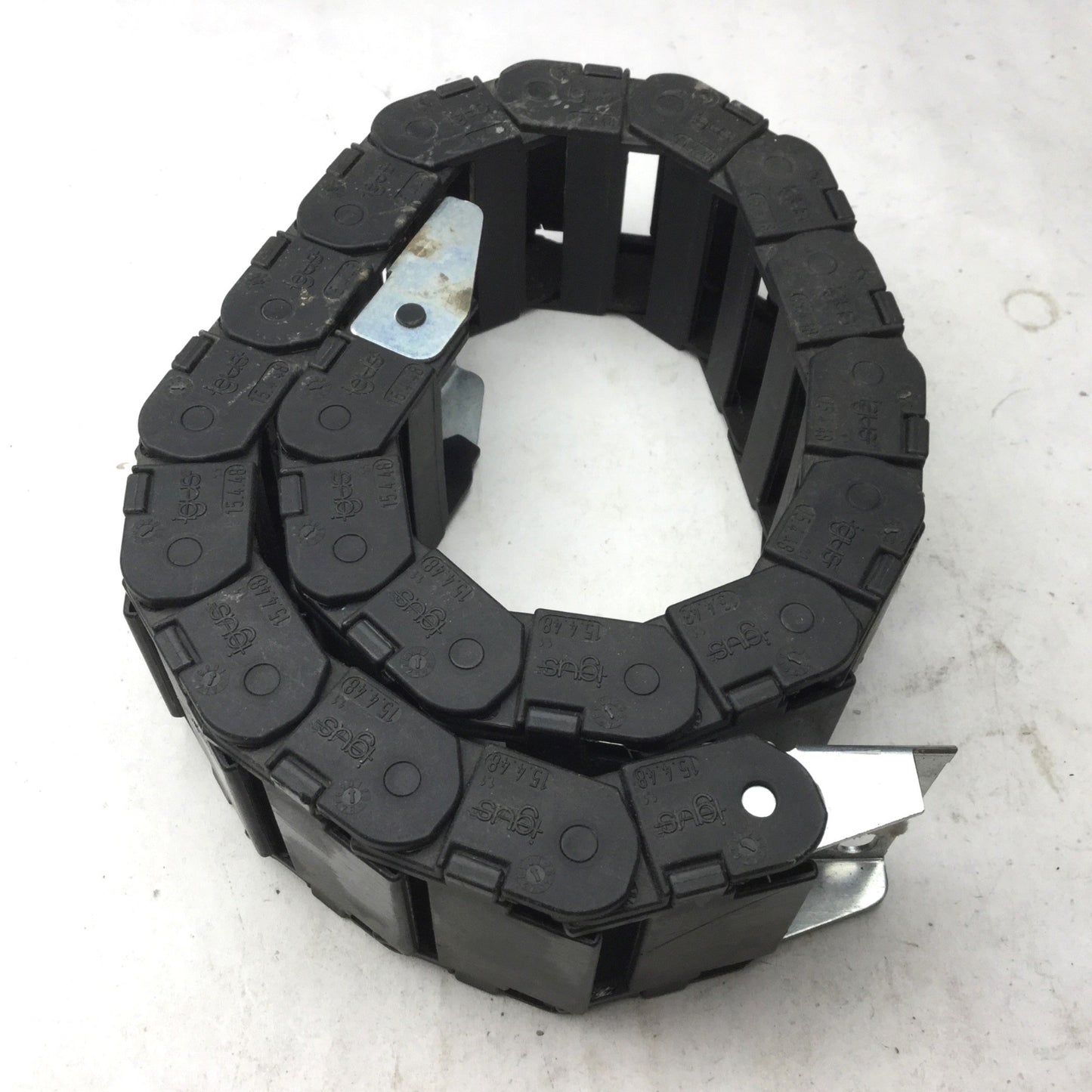 Used Igus 15.4.48 Energy Chain, Dimensions: 25"(L) x 2-3/8"(W) x 15/16"(H) 20 Links