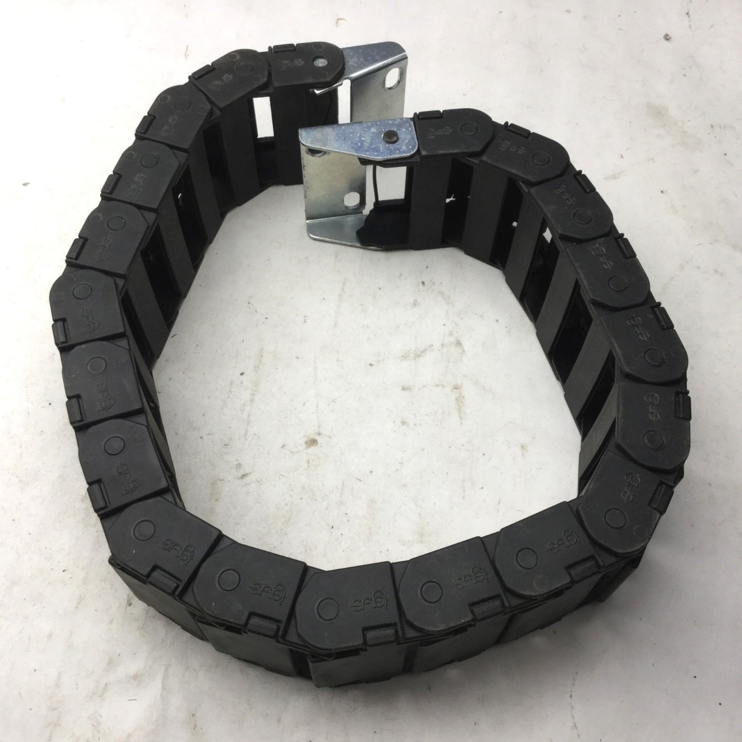 Used Igus 15.4.48 Energy Chain, Dimensions: 25"(L) x 2-3/8"(W) x 15/16"(H) 20 Links