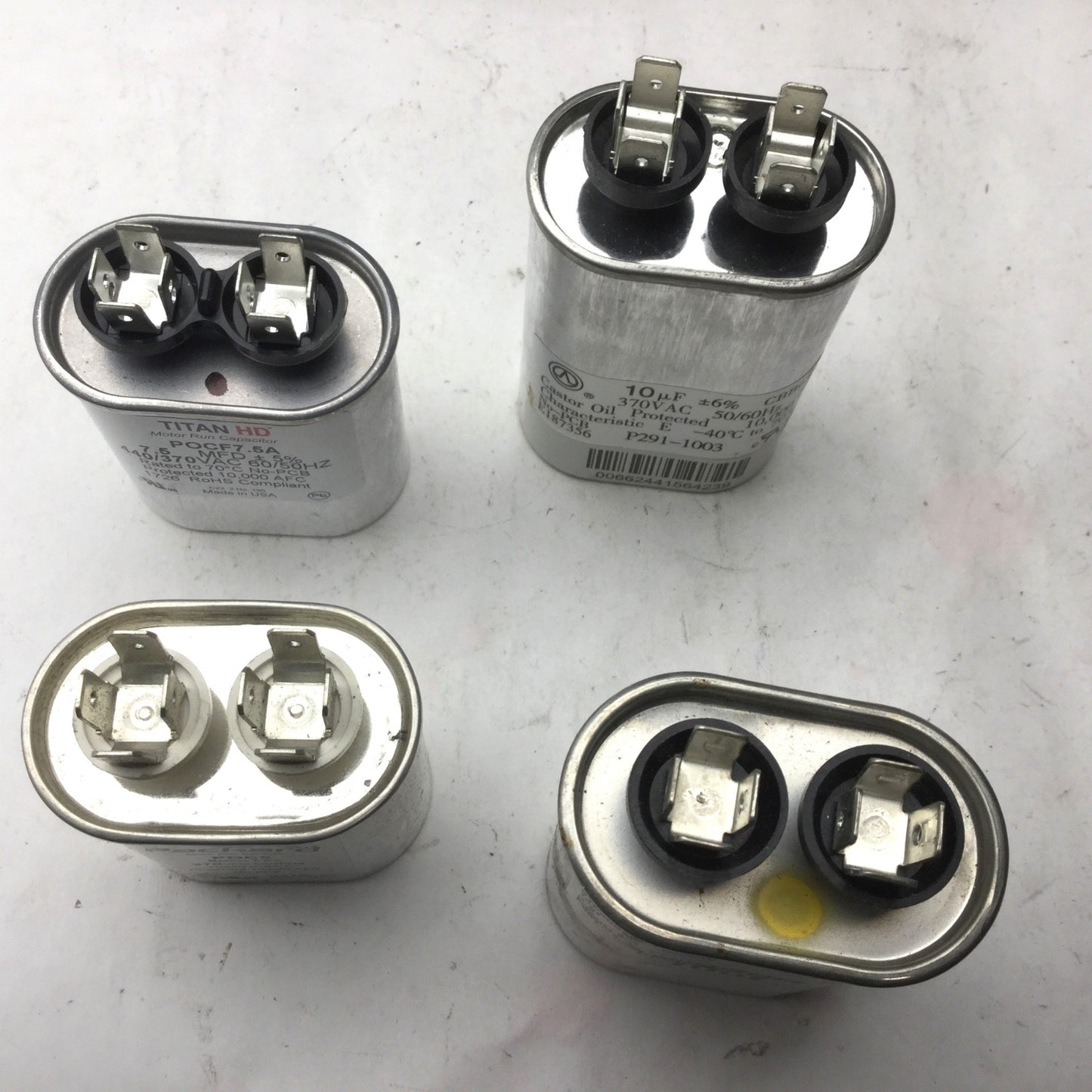 Used Lot of 4 Miscellaneous Capacitors, New POC5, New POCF7.5A, 2x P291-1003