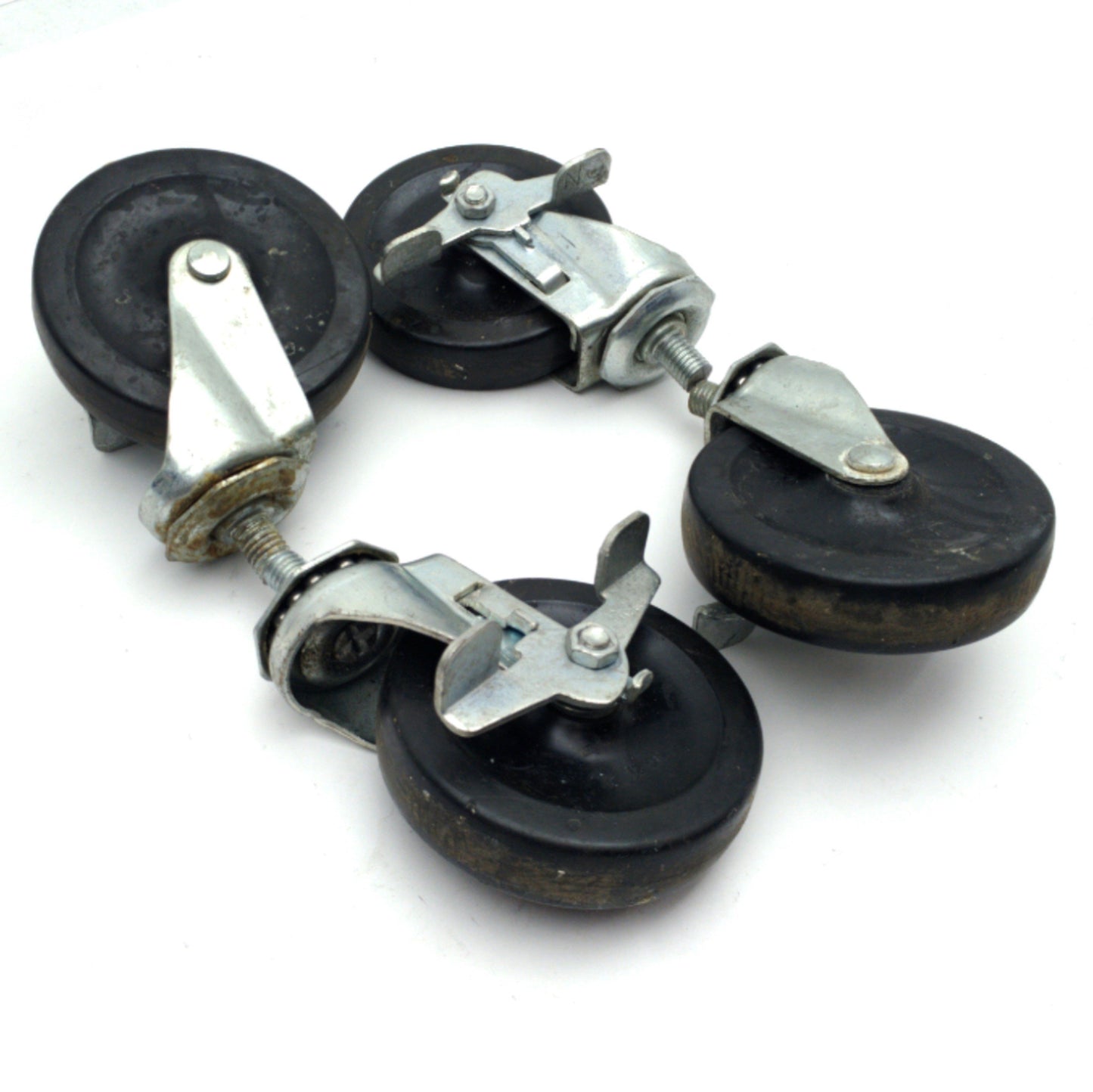 Used Lot of 4 Faultless Swivel Wheel Casters, 4" Dia. 1" Wide, 4 3/4" Height w/Brake
