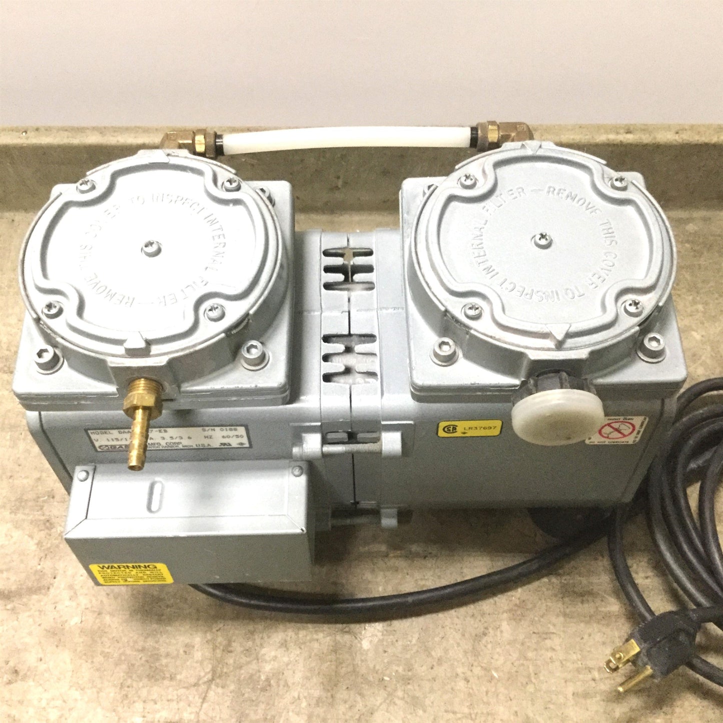 Used Gast DAA-V157-EB Vacuum Pump, Voltage 110/115V, Ports 1/4" NPT, Tested to 23inHg