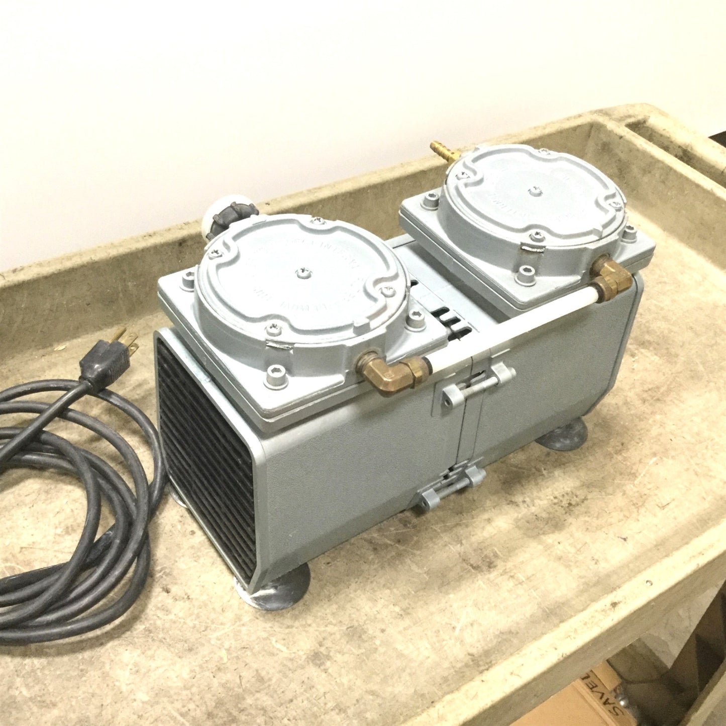 Used Gast DAA-V157-EB Vacuum Pump, Voltage 110/115V, Ports 1/4" NPT, Tested to 23inHg