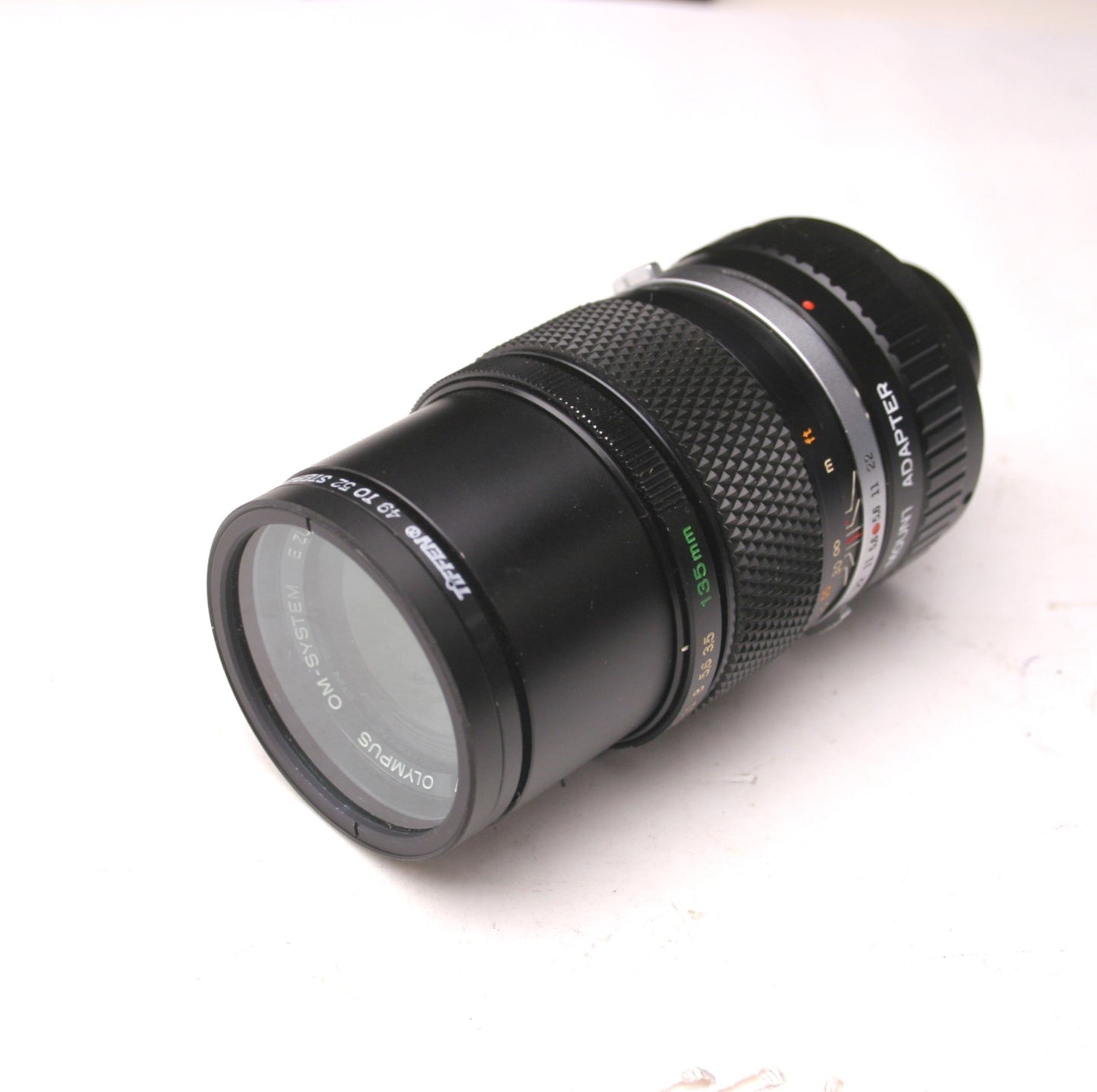 Used Olympus OM-System E. Zuiko AUTO-T 1:35 F=135mm, C Adapter, Tiffen 52mm SKY 1-A