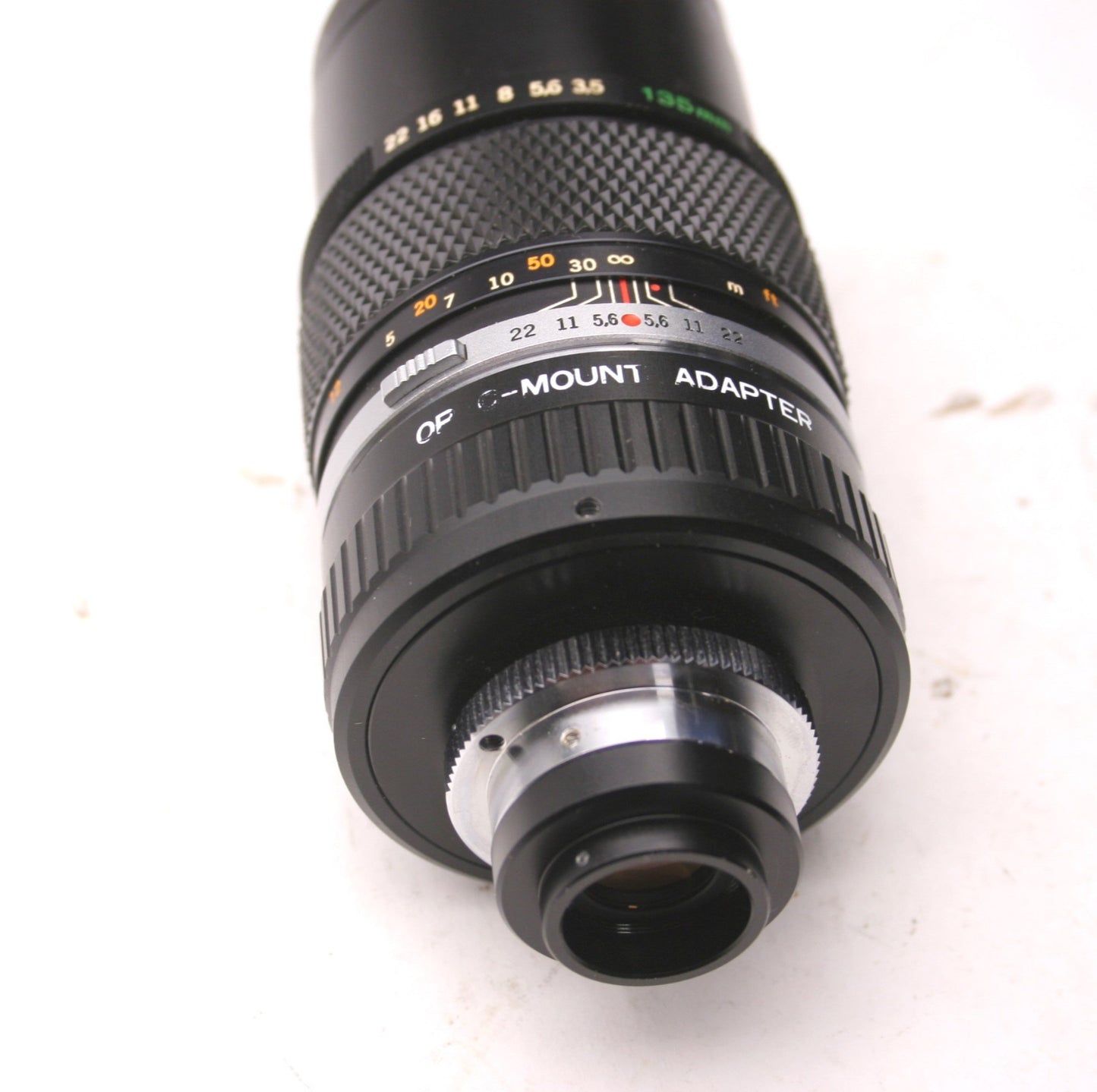 Used Olympus OM-System E. Zuiko AUTO-T 1:35 F=135mm, C Adapter, Tiffen 52mm SKY 1-A