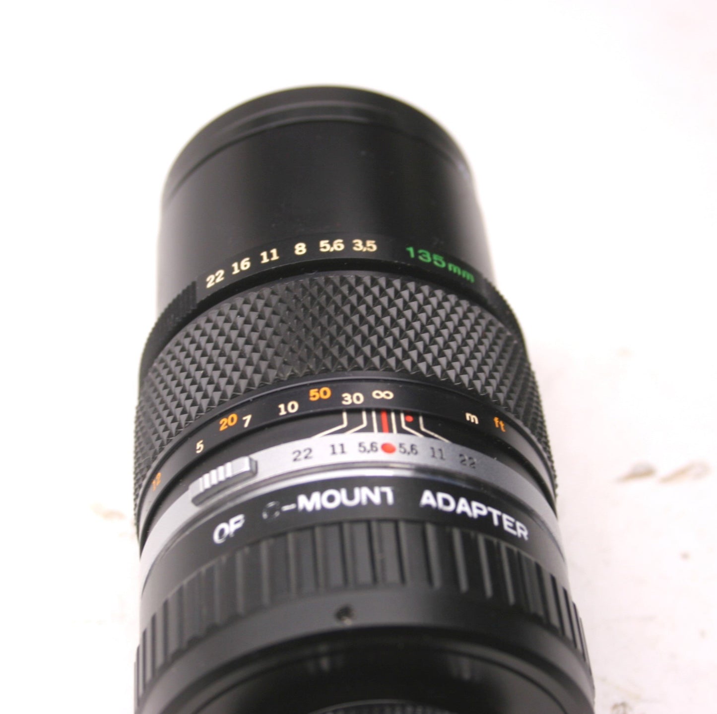 Used Olympus OM-System E. Zuiko AUTO-T 1:35 F=135mm, C Adapter, Tiffen 52mm SKY 1-A