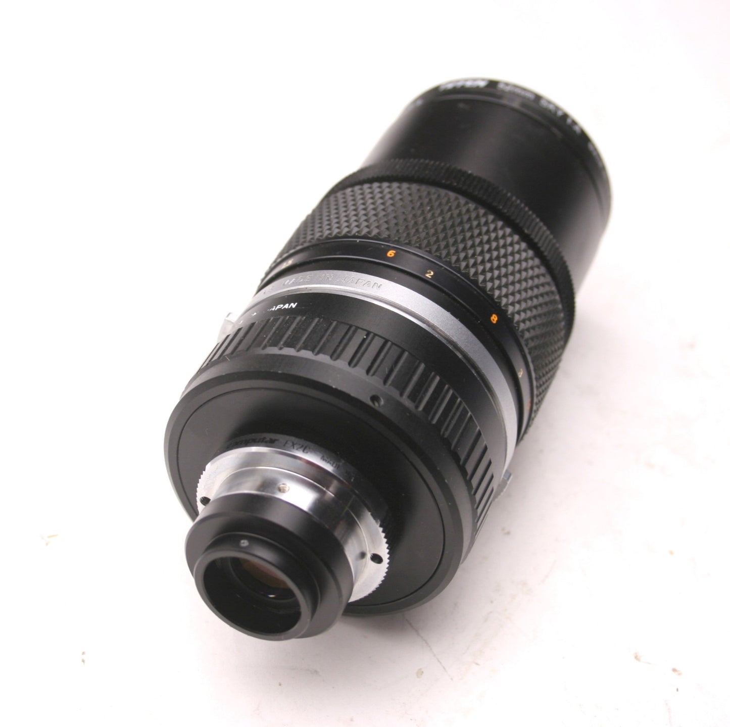 Used Olympus OM-System E. Zuiko AUTO-T 1:35 F=135mm, C Adapter, Tiffen 52mm SKY 1-A